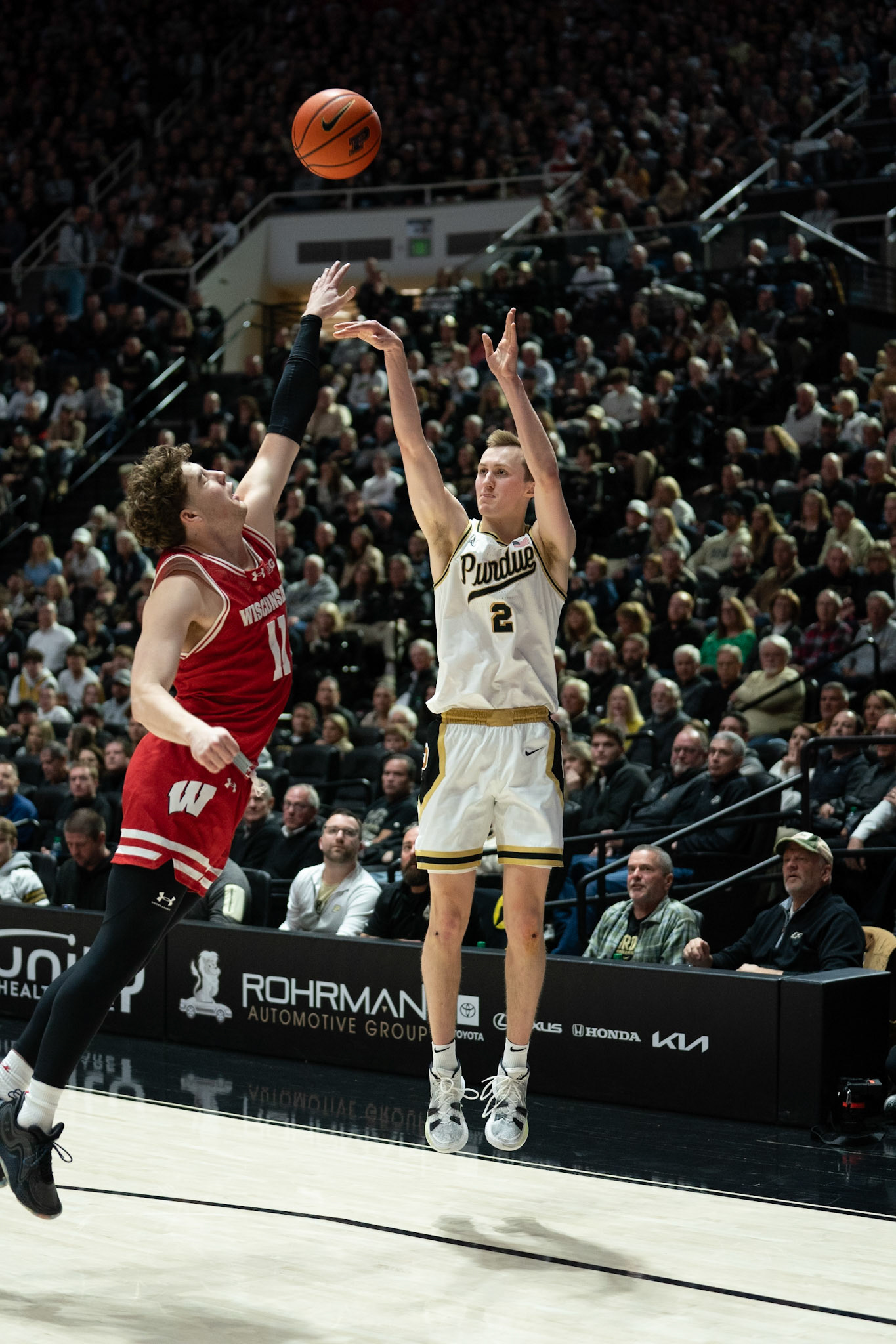 WEST LAFAYETTE, IN - MARCH 10, 2024: Purdue Sophomore Guard Fletcher Loyer (2), Wisconsin Junior Guard Max Klesmit (11) in Purdue University Boilermaker Basketball vs University of Wisconsin Badgers at Mackey Arena(Photo by Steve Bowen / Bowen Arrow Photography / Northern Indiana Sports Report)