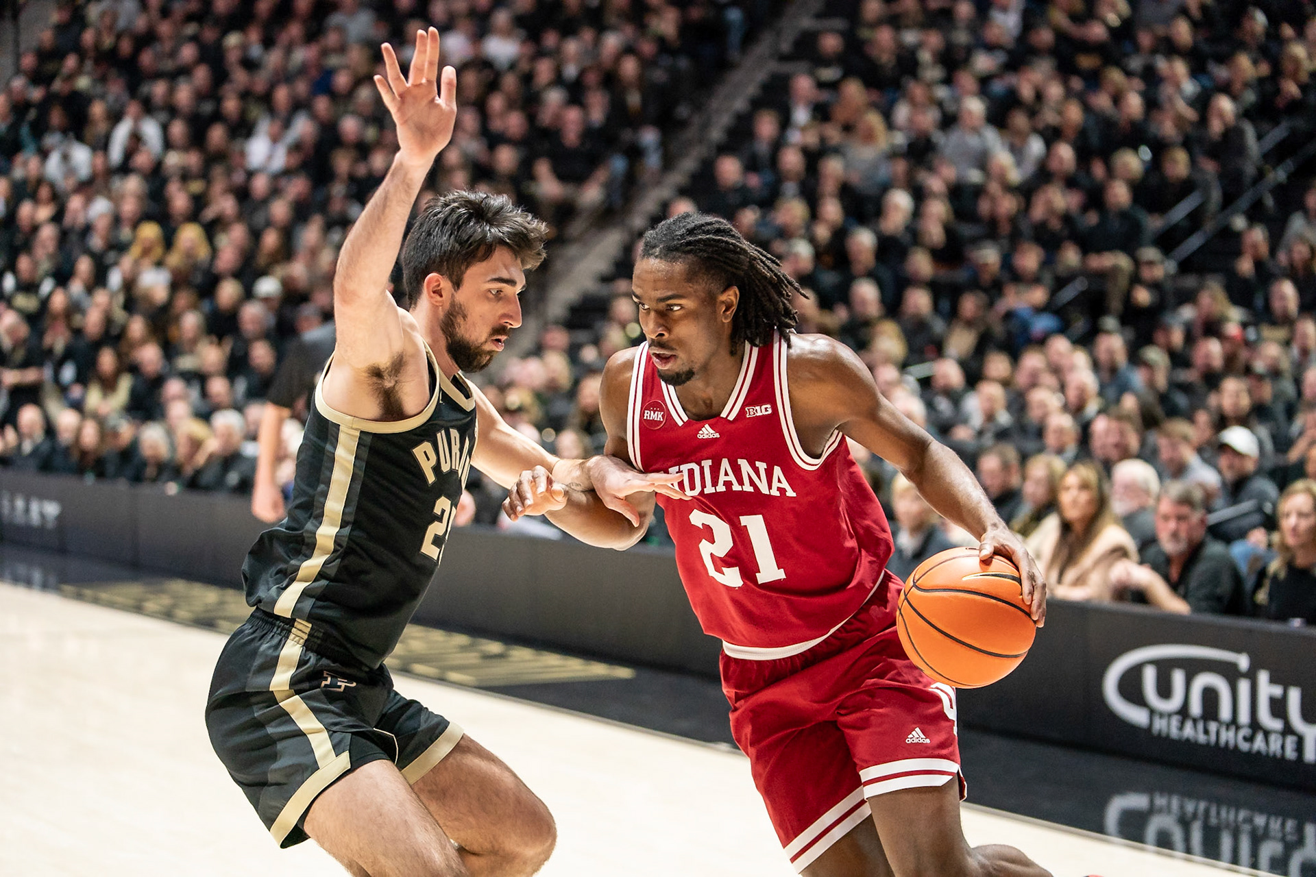WEST LAFAYETTE, IN - FEBRUARY 10, 2024: Indiana Freshman Forward Mackenzie Mgbako (21), Purdue Senior Guard Ethan Morton (25) in Purdue Boilermaker vs Indiana Hoosiers Basketball at Mackey Arena(Photo by Steve Bowen / Bowen Arrow Photography / Northern Indiana Sports Report)