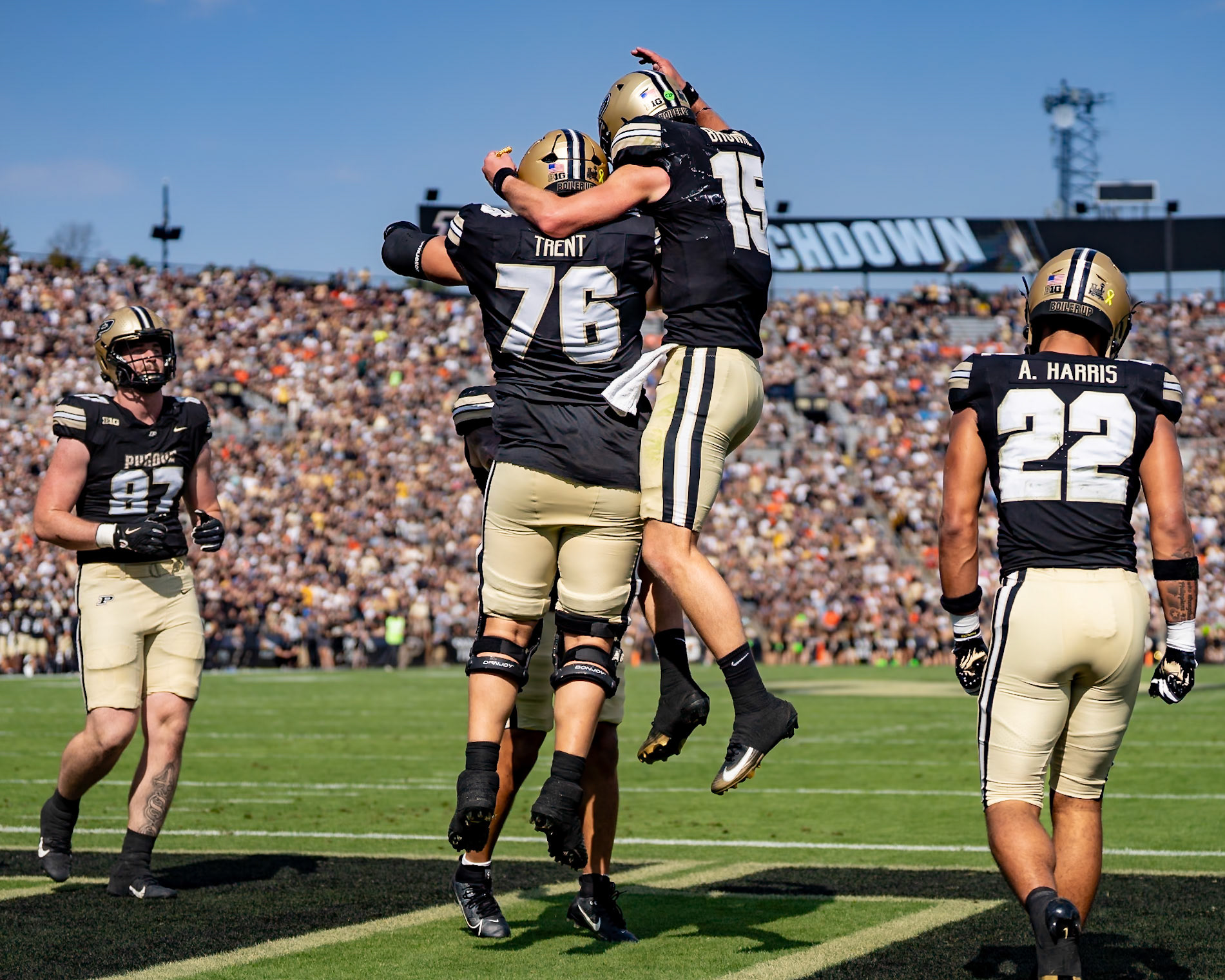 WEST LAFAYETTE, IN - OCTOBER 4, 2025: Purdue University Sophomore Quarterback Ryan Browne (15) celebrates with Purdue University Sophomore Offensive Lineman Ethan Trent (76) and other offensive lineman after scoring during the Purdue Boilermaker Football vs University of Illinois Fighting Illini at Ross-Ade Stadium(Photo by Steve Bowen / Northern Indiana Sports Report)
