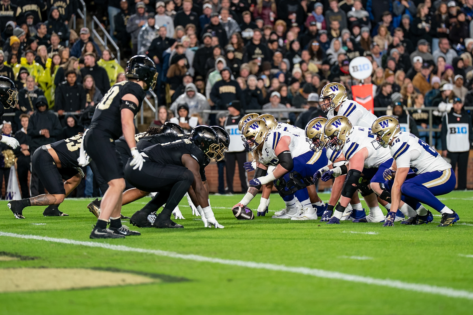WEST LAFAYETTE, IN - OCTOBER 16, 2026: University of Washington OL Landen Hatchett (66), University of Washington QB Elijah Brown (7) during the Purdue Boilermakers vs Washington Huskies football game at Ross-Ade Stadium(Photo by Steve Bowen / Northern Indiana Sports Report)