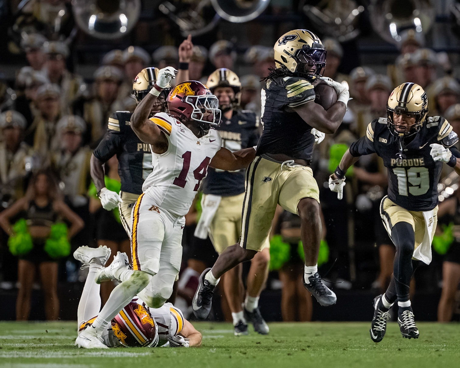WEST LAFAYETTE, IN - OCTOBER 10, 2026: Purdue University Sophomore Running Back Fame Ijeboi (2), University of Minnesota Senior DB Kerry Brown (14) during the Purdue Boilermakers vs Minnesota Golden Gophers football game at Ross-Ade Stadium(Photo by Steve Bowen / Northern Indiana Sports Report)