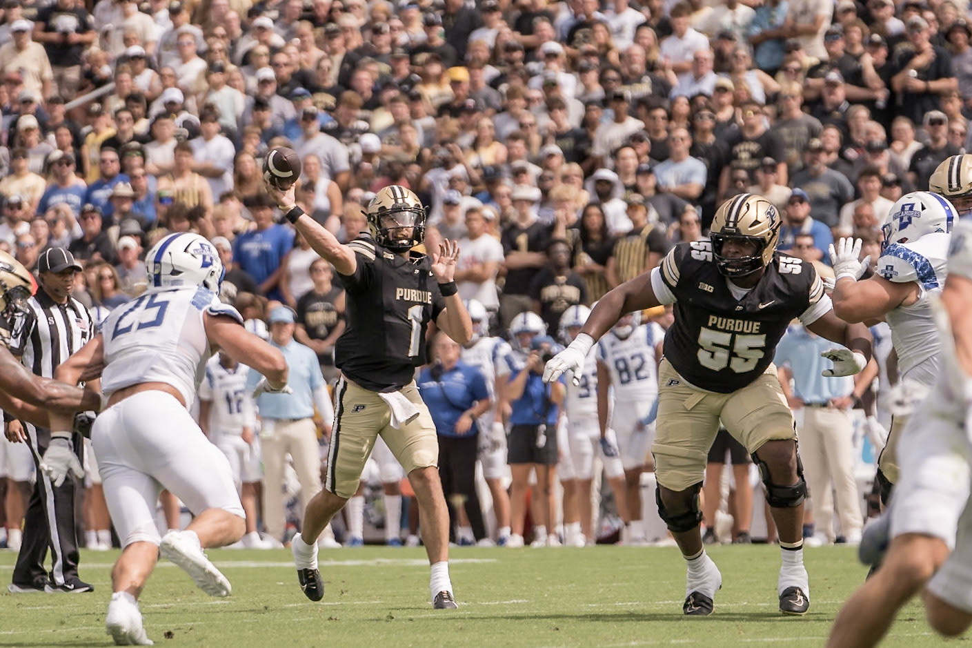 WEST LAFAYETTE, IN - AUGUST 31, 2024: Purdue Sr. QB Hudson Card (1) throwing a 1st quarter touchdown pass in Purdue Boilermaker Football vs Indiana State Sycamores at Ross-Ade Stadium(Photo by Steve Bowen / Bowen Arrow Photography / Northern Indiana Sports Report)