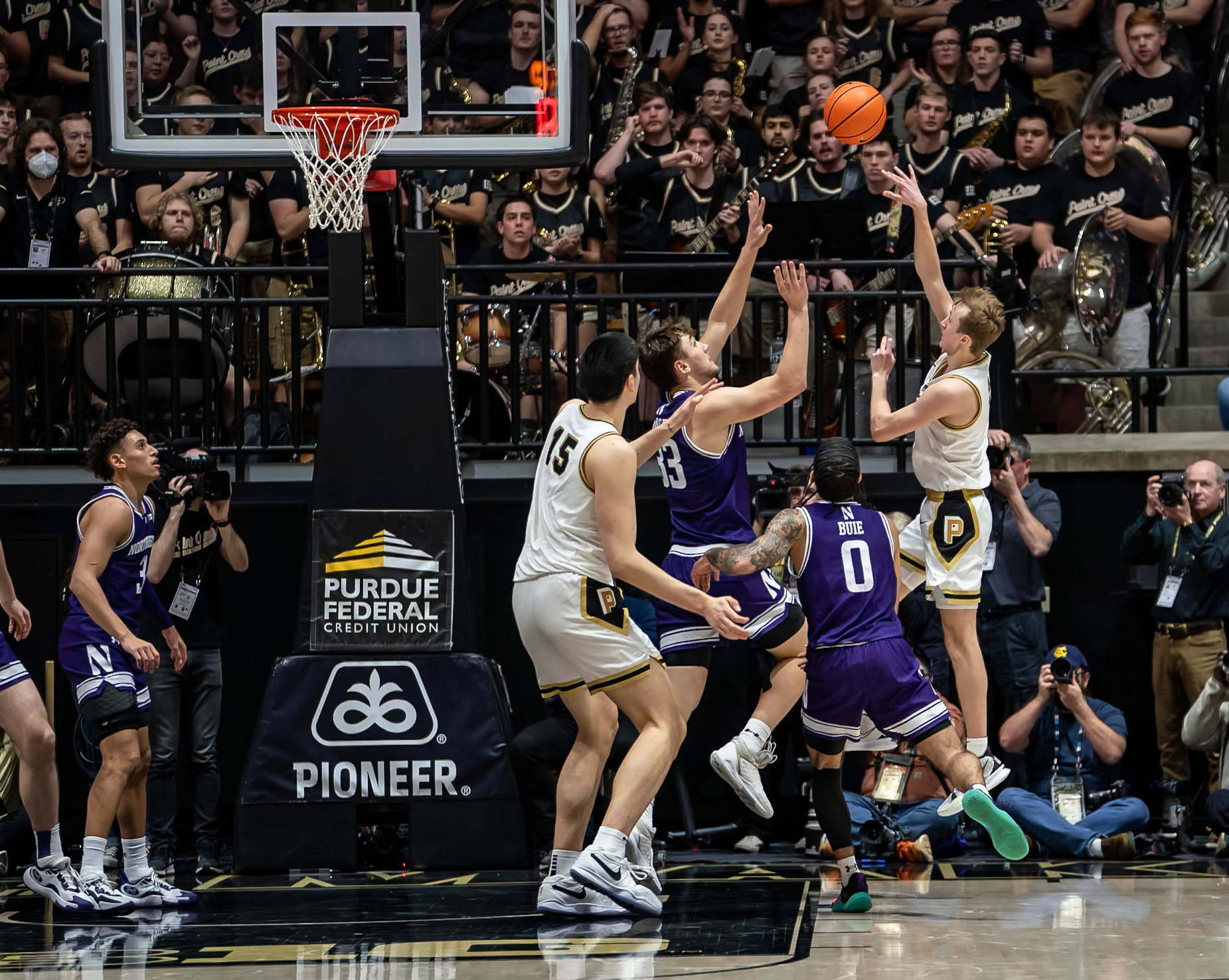 WEST LAFAYETTE, IN - JANUARY 31, 2024: Purdue Sophomore Guard Fletcher Loyer (2), Northwestern Sophomore Forward Luke Hunger (33) competing in Purdue Boilermakers Mens Basketball versus the Northwestern Wildcats at Mackey Arena(Photo by Steve Bowen / Bowen Arrow Photography / Northern Indiana Sports Report)