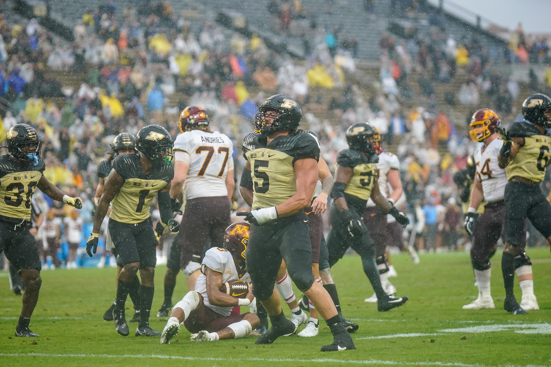 George Karlaftis (5), West Lafayette, IN, celebrates after tackling the Gophers running back behind the line