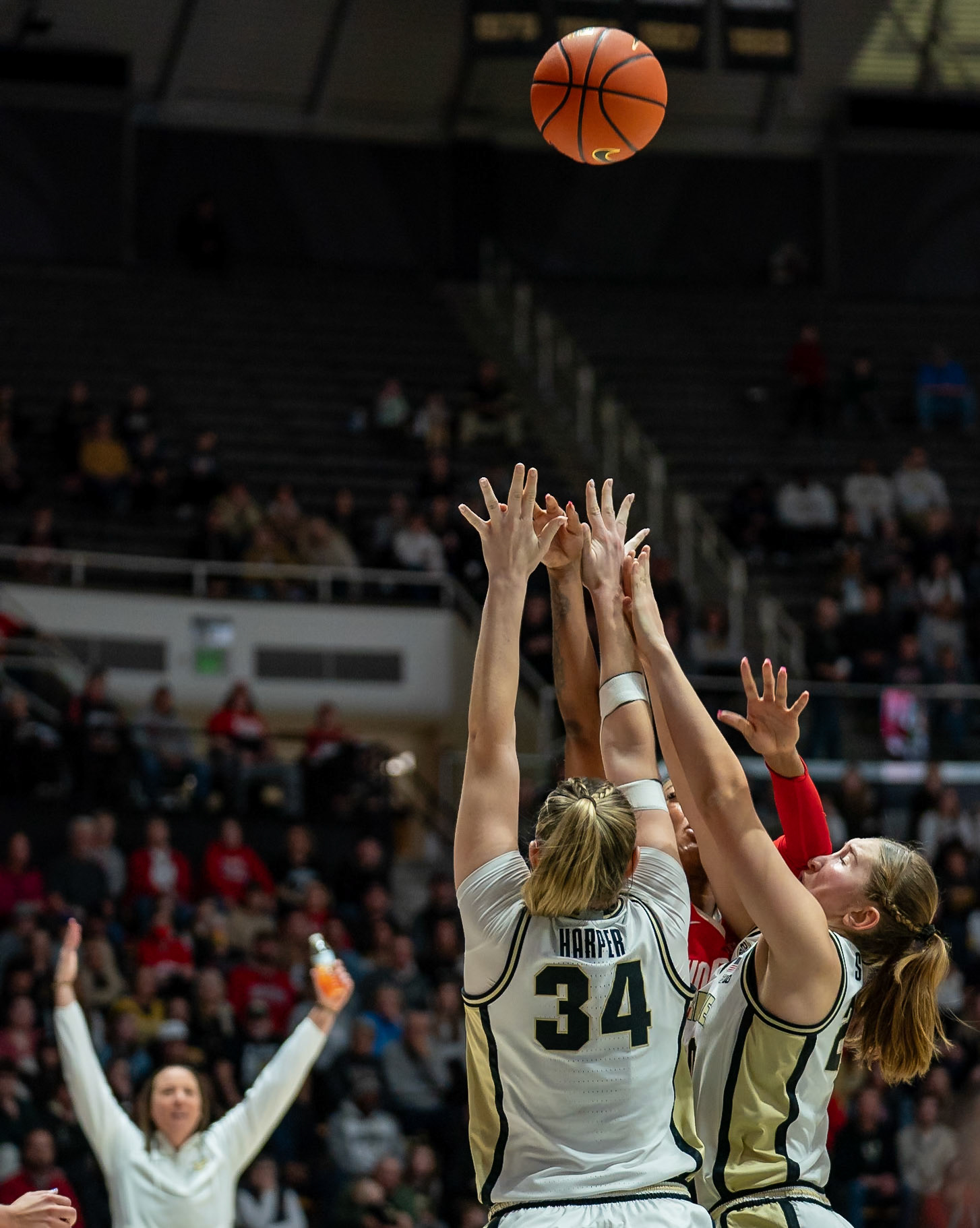WEST LAFAYETTE, IN - JANUARY 28, 2024: Ohio State Forward Sophomore Cotie McMahon (32), Purdue Freshman Forward Mary Ashley Stevenson (20), Purdue 6th Year Forward Caitlyn Harper (34) competing in Purdue Boilermaker Women's Basketball versus the Ohio State Buckeyes at Mackey Arena(Photo by Steve Bowen / Bowen Arrow Photography / Northern Indiana Sports Report)