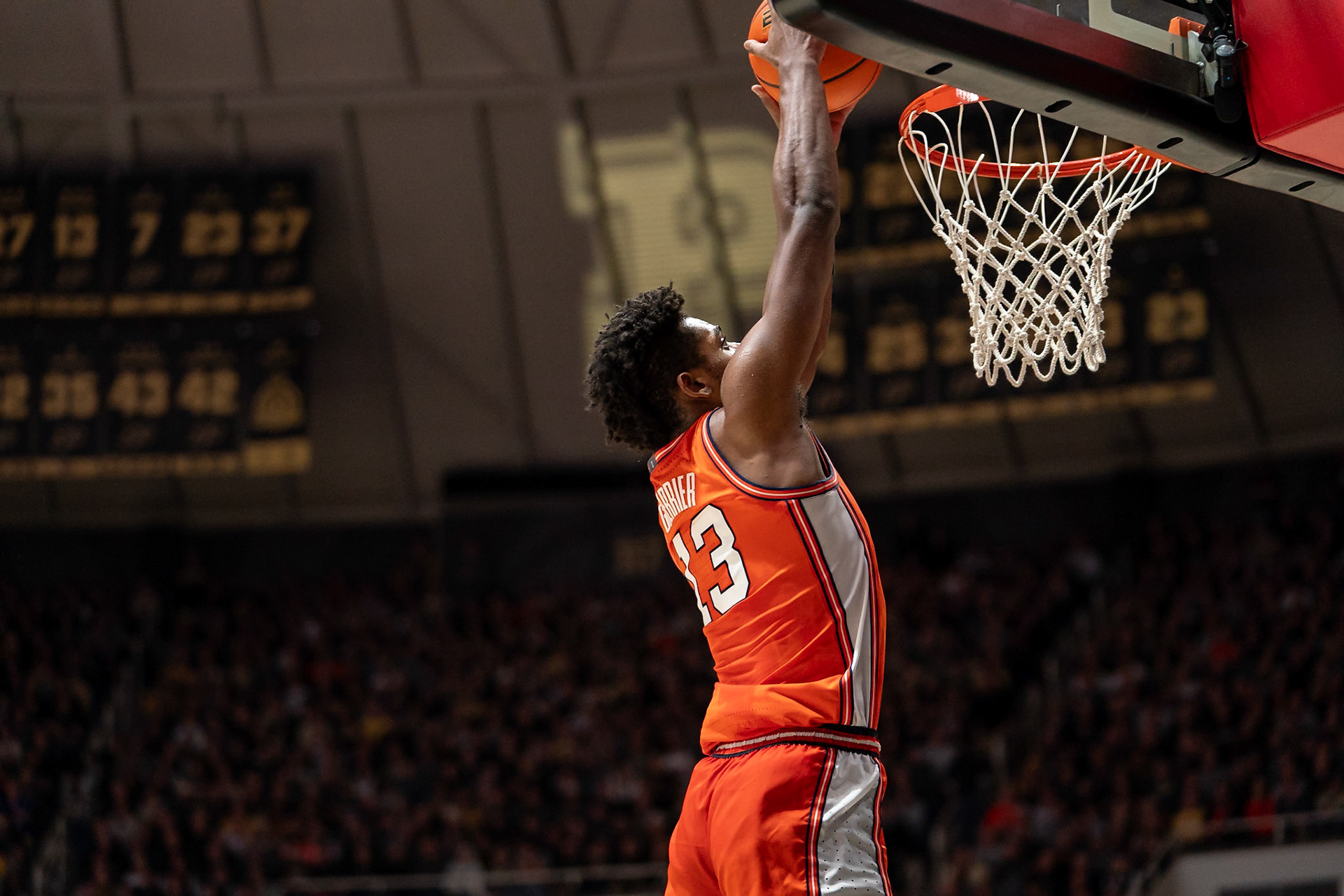 WEST LAFAYETTE, IN - JANUARY 5, 2024: Illinois Graduate Guard/Forward Quincy Guerrier (13) putting in an alley oop dunk in Purdue Boilermaker's Basketball vs the Illinois Fighting Illini at Mackey Arena(Photo by Steve Bowen / Bowen Arrow Photography / Northern Indiana Sports Report)