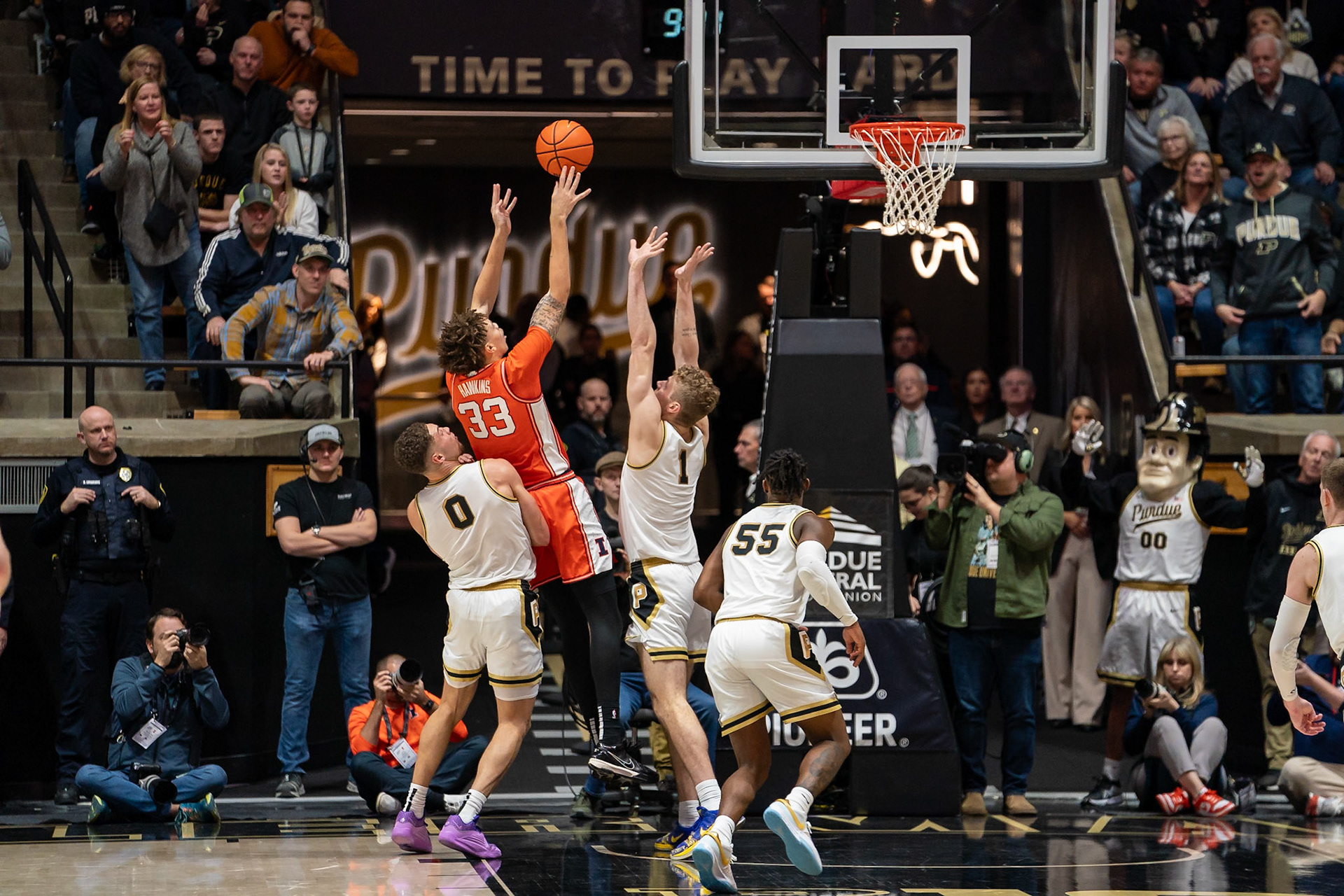 WEST LAFAYETTE, IN - JANUARY 5, 2024: Illinois Senior Forward Coleman Hawkins (33) while Purdue Senior Forward Mason Gillis (0) and Purdue Junior Forward Caleb Furst (1) try to stop him in Purdue Boilermaker's Basketball vs the Illinois Fighting Illini at Mackey Arena(Photo by Steve Bowen / Bowen Arrow Photography / Northern Indiana Sports Report)