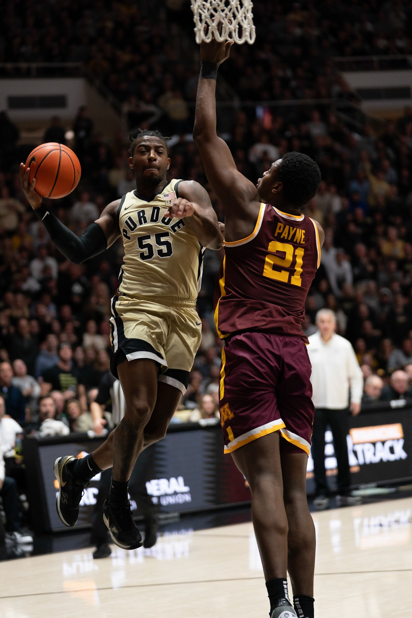 WEST LAFAYETTE, IN - FEBRUARY 15, 2024: Purdue 5th year Guard Lance Jones (55), Minnesota Sophomore Forward Pharrel Payne (21) in Purdue Boilermakers Men's Basketball vs the Minnesota Golden Gophers at Mackey Arena(Photo by Steve Bowen / Bowen Arrow Photography / Northern Indiana Sports Report)