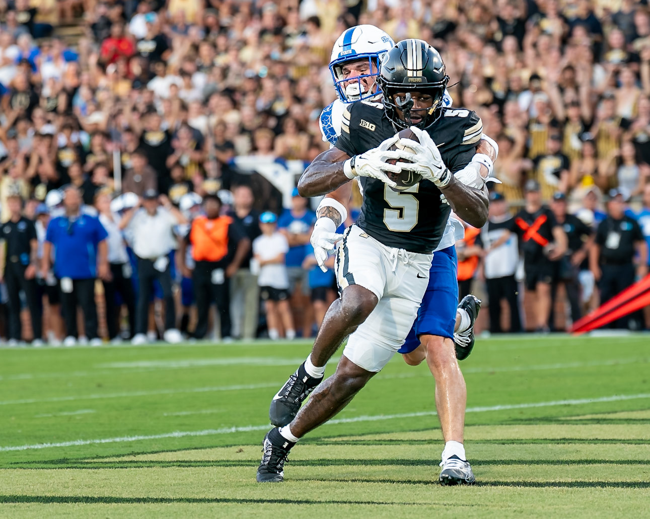 WEST LAFAYETTE, IN - SEPTEMBER 4, 2026: Purdue University Senior Wide Receiver Chauncey Magwood (5) scores the first touchdown of the 2026 season after a catch from Purdue University Quarterback Ryan Browne (15) during the Purdue Boilermaker Football game vs the Indiana State Sycamores at Ross-Ade Stadium(Photo by Steve Bowen / Northern Indiana Sports Report)
