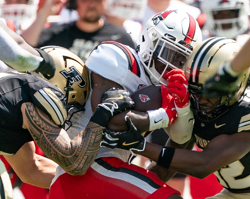WEST LAFAYETTE, IN - AUGUST 30, 2025: Ball State University R-Jr. RB Qua Ashley (9), being tackled by Purdue University Junior Defensive Back Ryan Turner (12) at Purdue Boilermaker Football vs Ball State Football at Ross-Ade Stadium(Photo by Steve Bowen / Northern Indiana Sports Report)