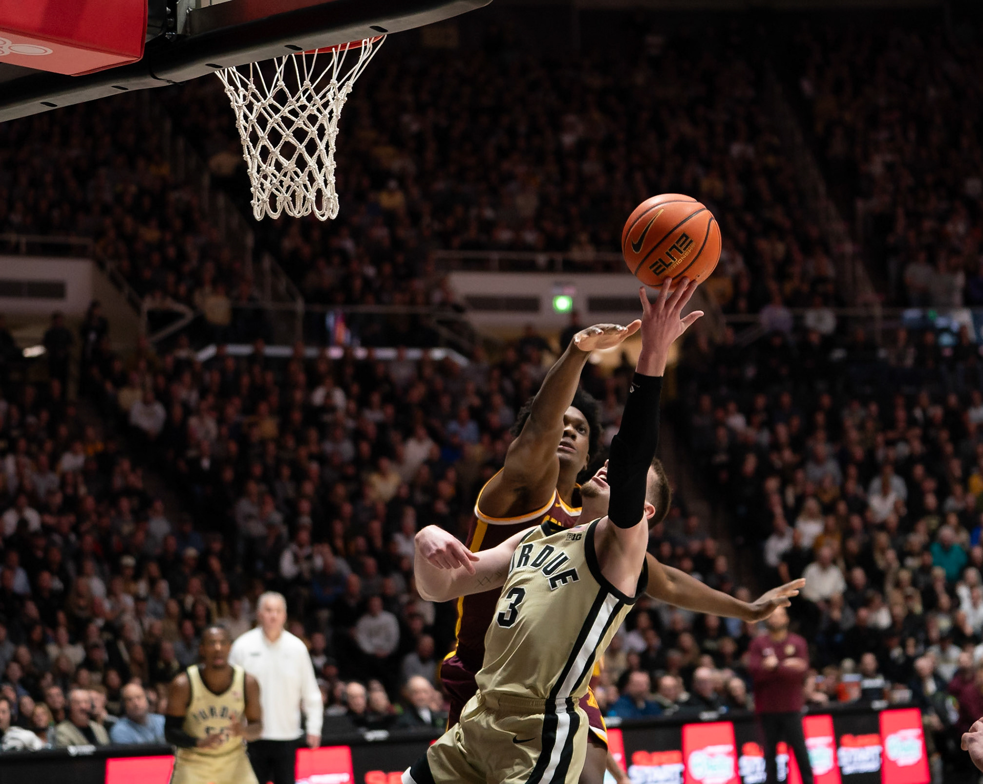 WEST LAFAYETTE, IN - FEBRUARY 15, 2024: Purdue Sophomore Guard Braden Smith (3), Minnesota Sophomore Forward Joshua Ola-Joseph (1) in Purdue Boilermakers Men's Basketball vs the Minnesota Golden Gophers at Mackey Arena(Photo by Steve Bowen / Bowen Arrow Photography / Northern Indiana Sports Report)