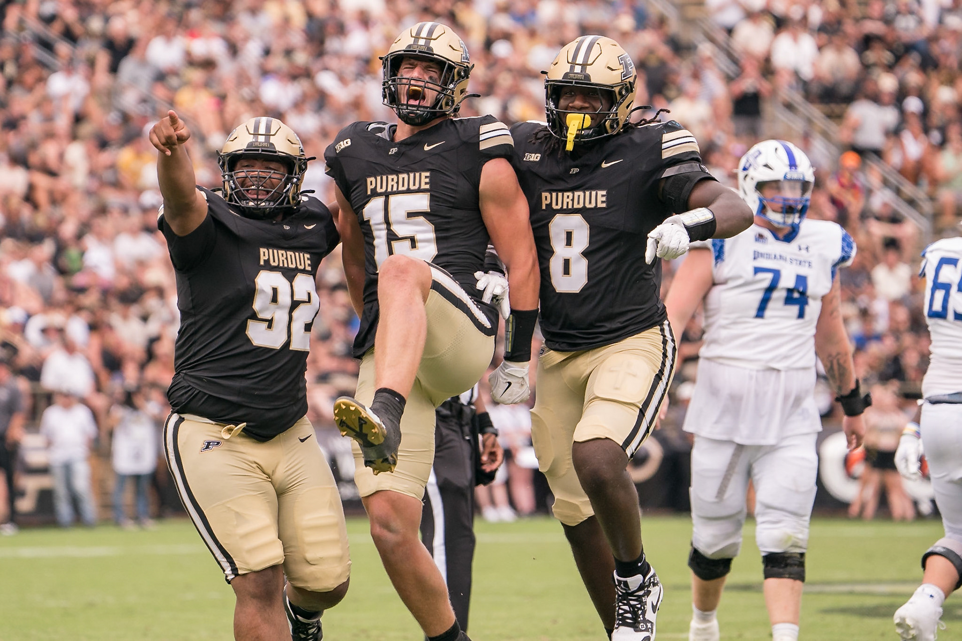WEST LAFAYETTE, IN - AUGUST 31, 2024: Purdue So. RUSH END Will Heldt (15), Purdue So. RUSH END CJ Madden (8), Purdue Jr. DL Mo Omonode (92) in Purdue Boilermaker Football vs Indiana State Sycamores at Ross-Ade Stadium(Photo by Steve Bowen / Bowen Arrow Photography / Northern Indiana Sports Report)