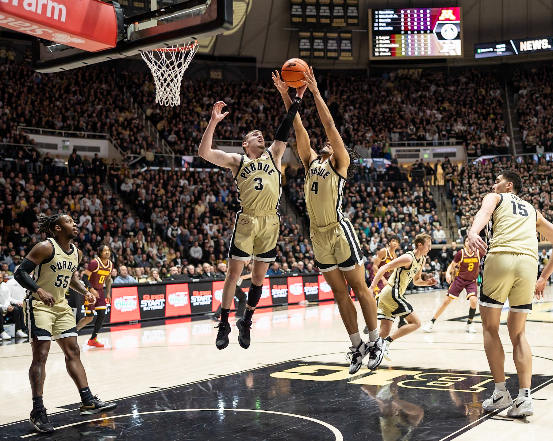 WEST LAFAYETTE, IN - FEBRUARY 15, 2024: Purdue Sophomore Forward Trey Kaufman-Renn (4), Purdue Sophomore Guard Braden Smith (3) in Purdue Boilermakers Men's Basketball vs the Minnesota Golden Gophers at Mackey Arena(Photo by Steve Bowen / Bowen Arrow Photography / Northern Indiana Sports Report)