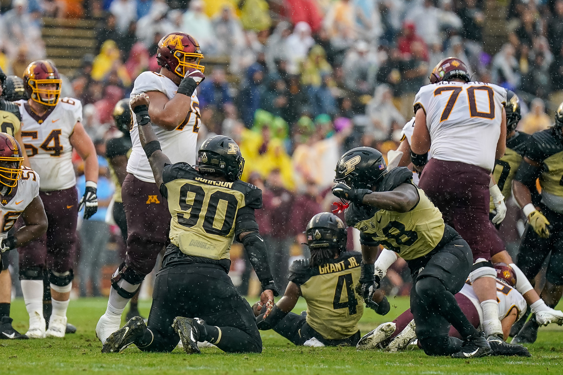 Lawrence Johnson (90), Fort Wayne, IN celebrates after stopping the Gophers on 3rd down
