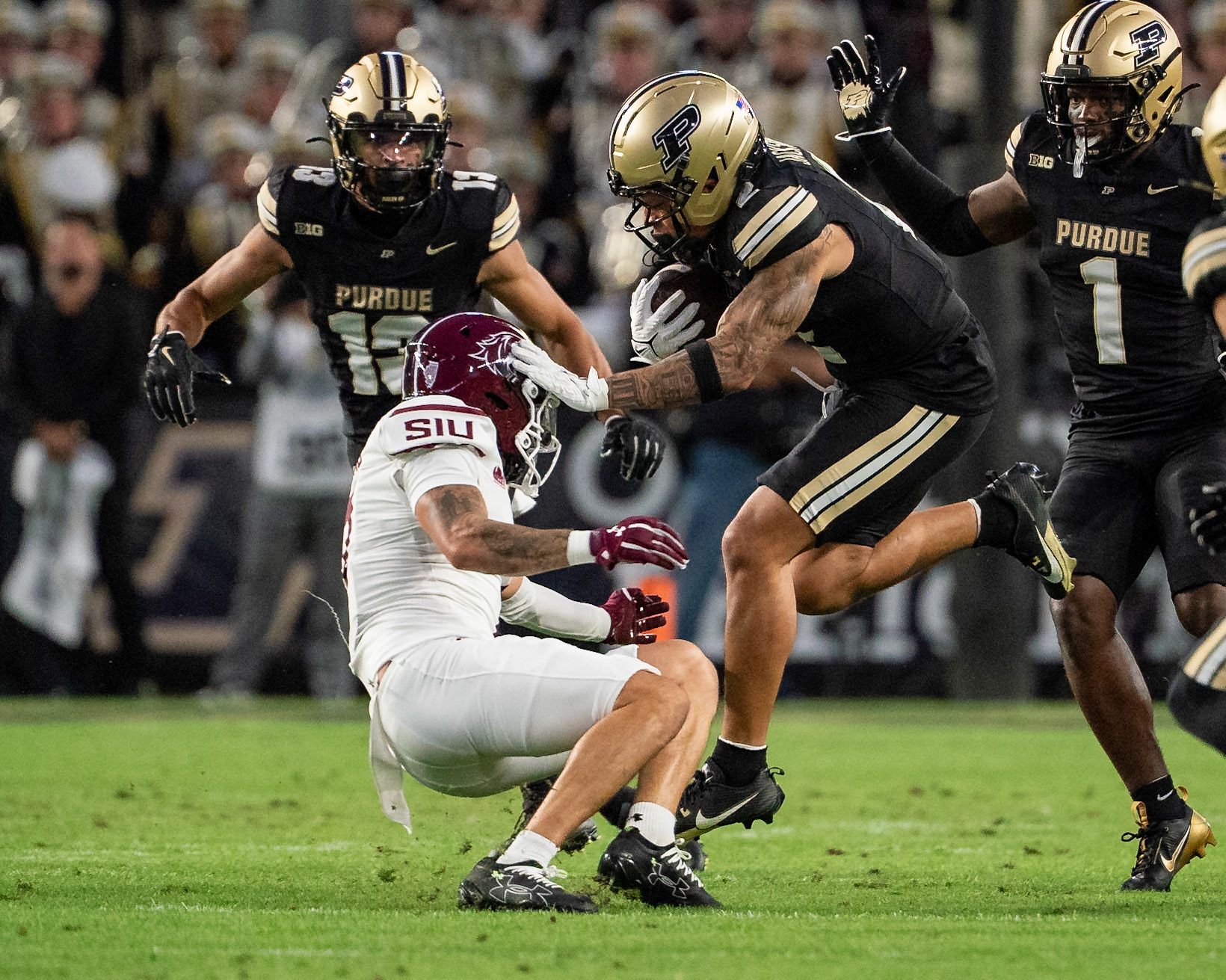 WEST LAFAYETTE, IN - SEPTEMBER 6, 2025: Purdue University Senior Wide Receiver Michael Jackson III (2) stiff arms a defender at Purdue Boilermaker Football vs Southern Illinois Saluki Football at Ross-Ade Stadium(Photo by Steve Bowen / Northern Indiana Sports Report)