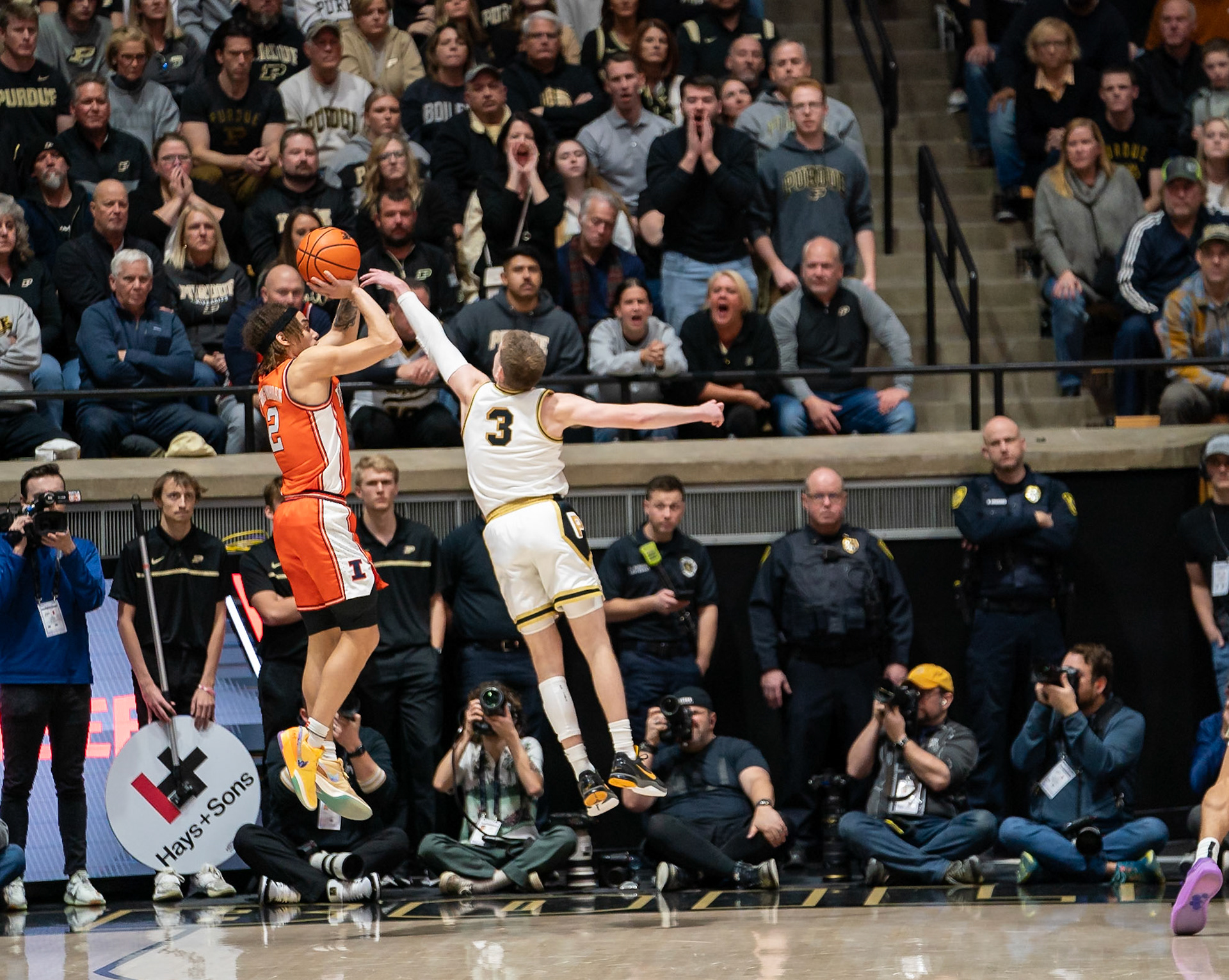 WEST LAFAYETTE, IN - JANUARY 5, 2024: Illinois Freshman Guard Dra Gibbs-Lawhorn (2) pulling up for a shot while Purdue Sophomore Guard Braden Smith (3) tries to block him in Purdue Boilermaker's Basketball vs the Illinois Fighting Illini at Mackey Arena(Photo by Steve Bowen / Bowen Arrow Photography / Northern Indiana Sports Report)