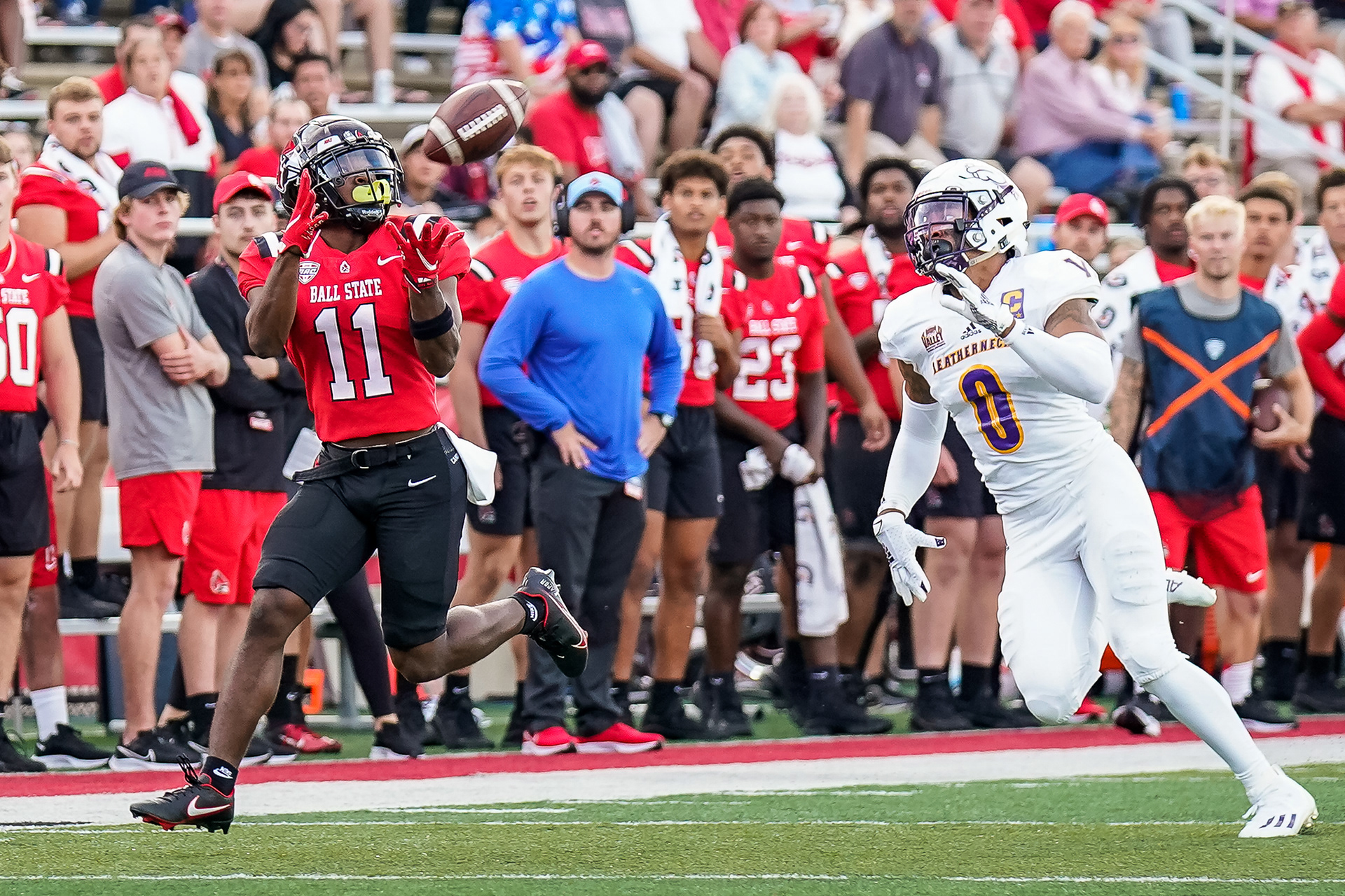 BSU's Justin Hall catching a 48 yard TD pass as WIU's Jalen Powe chases him