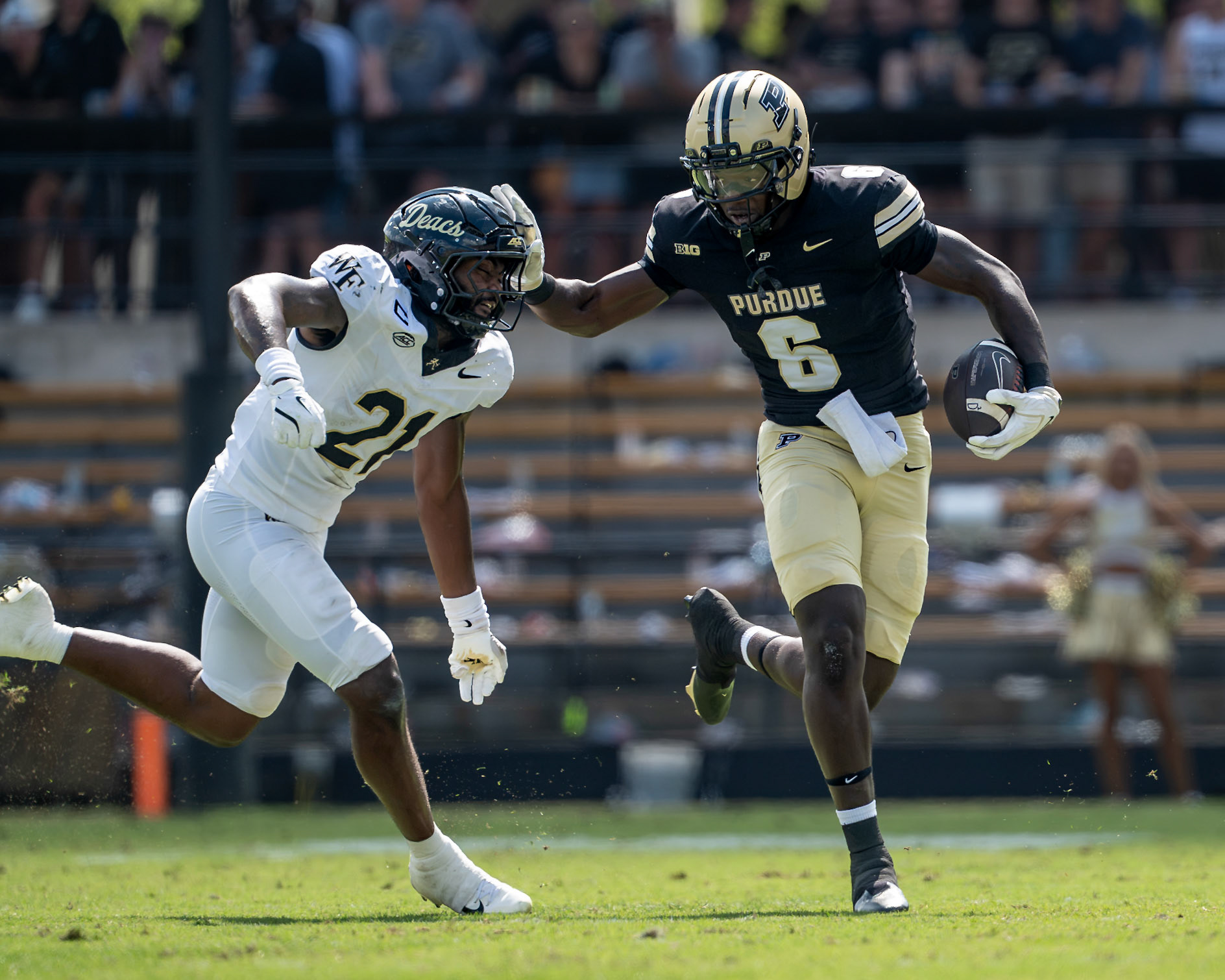 WEST LAFAYETTE, IN - SEPTEMBER 12, 2026: Purdue University Freshman Tight End Ar'Mari Towns (6) stiff arming Wake Forest University Linebacker Aiden Hall (21) during the Purdue Boilermakers football game vs the Wake Forest Demon Deacons at Ross-Ade Stadium(Photo by Steve Bowen / Northern Indiana Sports Report)