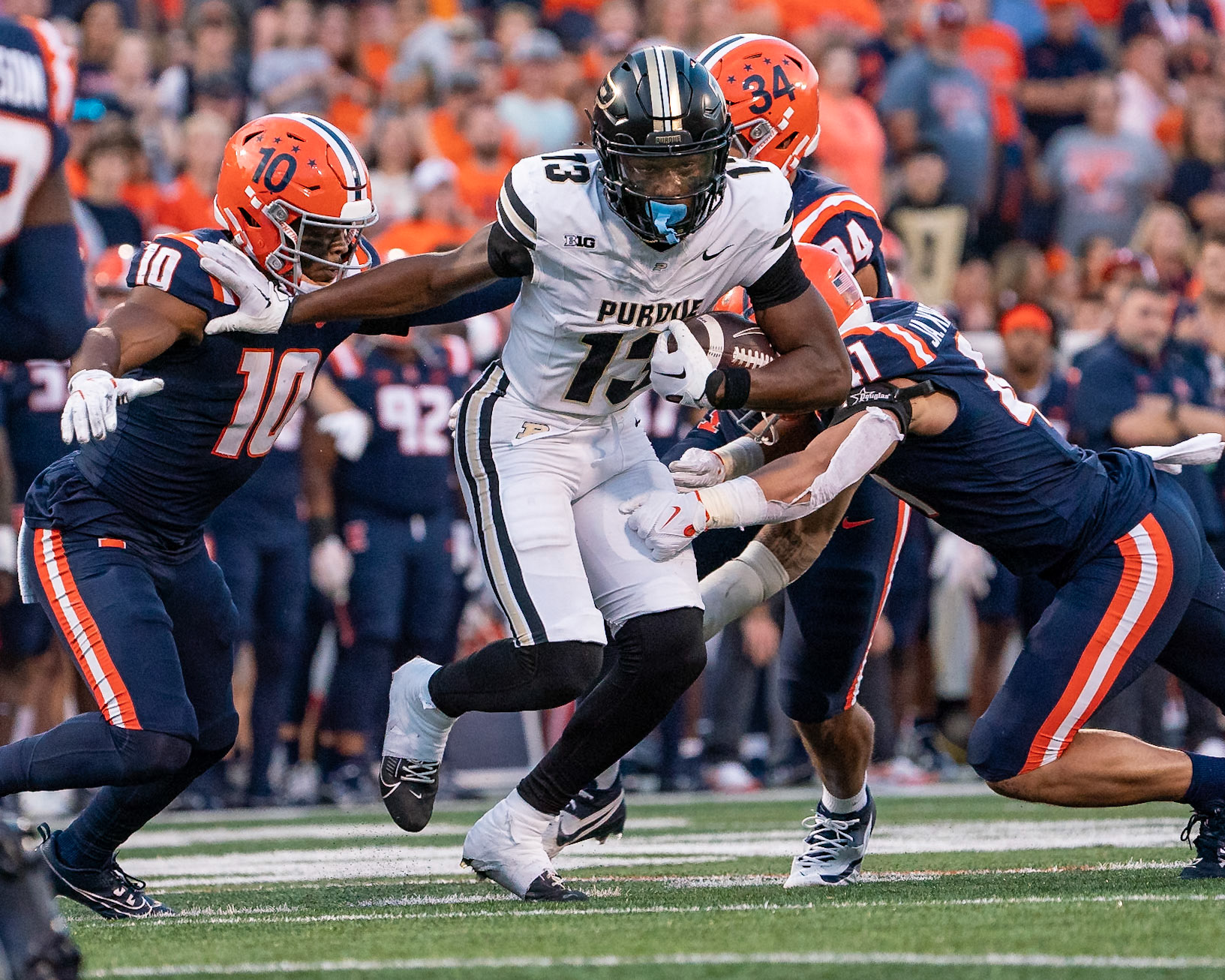 CHAMPAIGN, IL - OCTOBER 12, 2024: Purdue University Sophomore Wide Receiver Jaron Tibbs (13), University of Illinois Junior DB Miles Scott (10) during the Purdue University Boilermakers at University of Illinois Fighting Illini Football game at Memorial Stadium(Photo by Steve Bowen / Bowen Arrow Photography / Northern Indiana Sports Report)