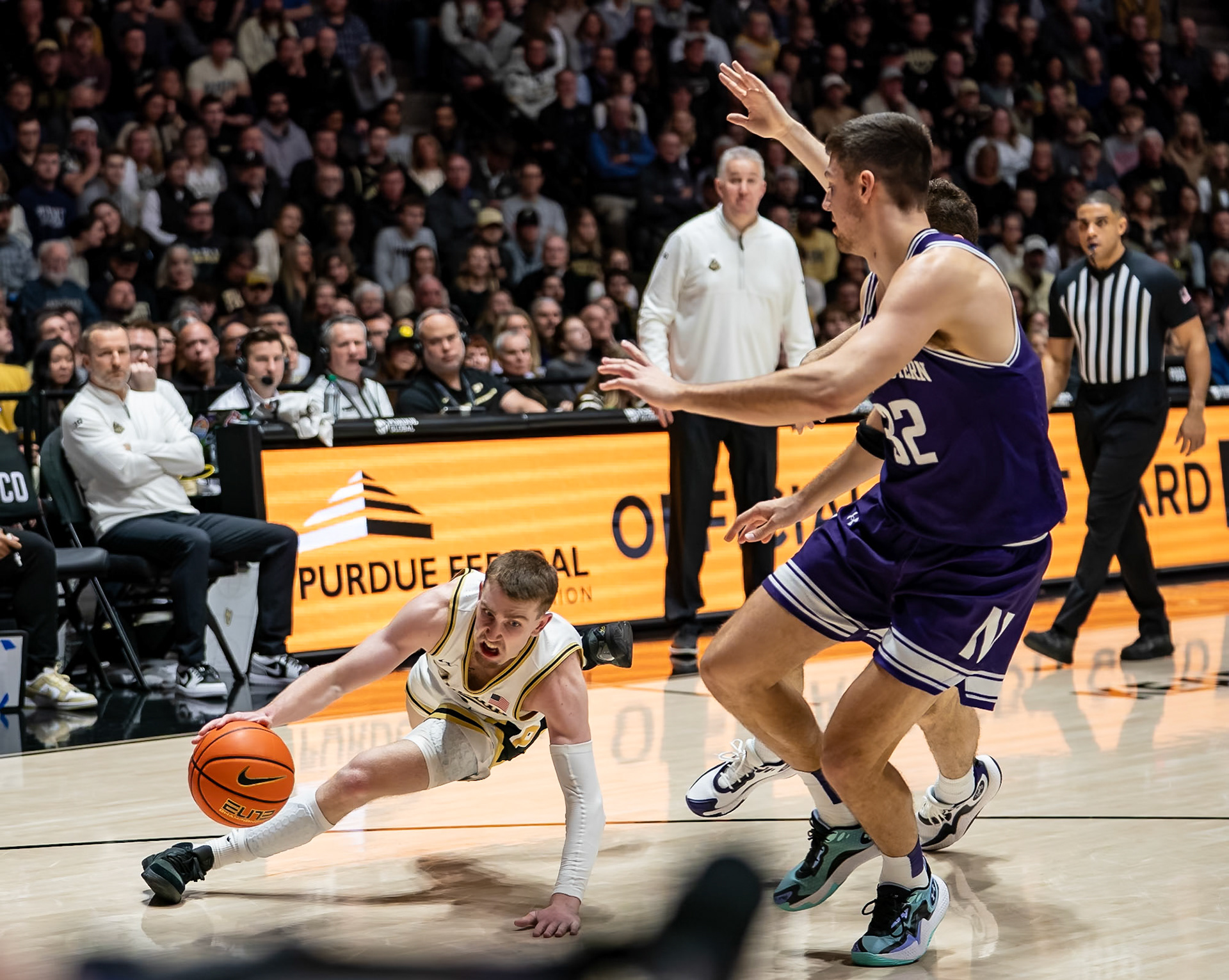 WEST LAFAYETTE, IN - JANUARY 31, 2024: Purdue Sophomore Guard Braden Smith (3), Northwestern Graduate Forward Blake Preston (32) competing in Purdue Boilermakers Mens Basketball versus the Northwestern Wildcats at Mackey Arena(Photo by Steve Bowen / Bowen Arrow Photography / Northern Indiana Sports Report)