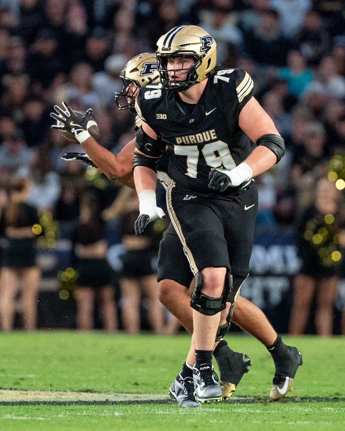 WEST LAFAYETTE, IN - SEPTEMBER 6, 2025: Purdue University Junior Offensive Lineman Joey Tanona (79) getting in position to bloick as Purdue University Senior Running Back Devin Mockobee (45) catches a screen pass at Purdue Boilermaker Football vs Southern Illinois Saluki Football at Ross-Ade Stadium(Photo by Steve Bowen / Northern Indiana Sports Report)