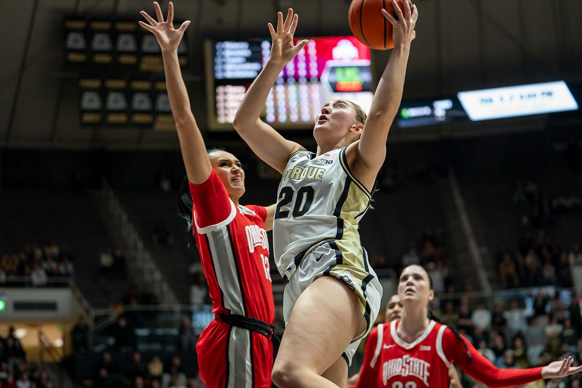 WEST LAFAYETTE, IN - JANUARY 28, 2024: Purdue Freshman Forward Mary Ashley Stevenson (20), Ohio State Guard Graduate Celeste Taylor (12) competing in Purdue Boilermaker Women's Basketball versus the Ohio State Buckeyes at Mackey Arena(Photo by Steve Bowen / Bowen Arrow Photography / Northern Indiana Sports Report)