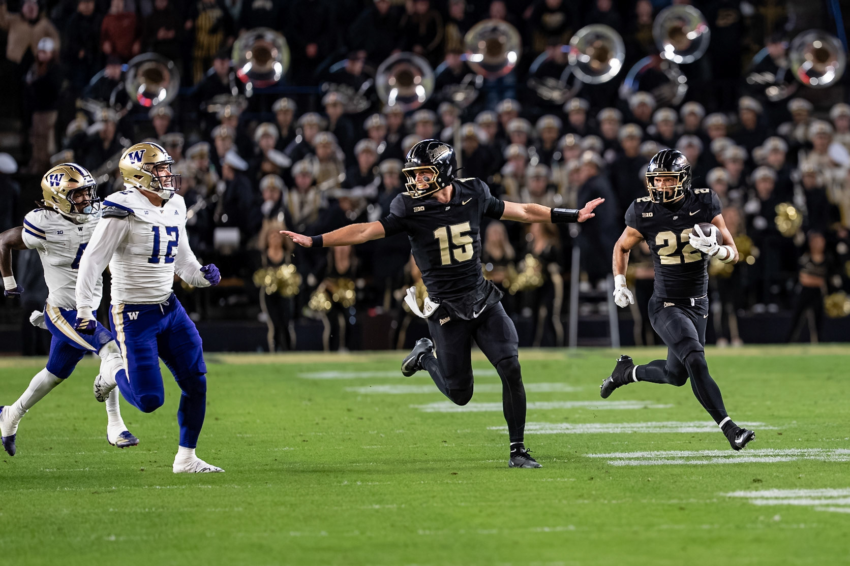WEST LAFAYETTE, IN - OCTOBER 16, 2026: Purdue University Freshman Running Back Antonio Harris (22), Purdue University Quarterback Ryan Browne (15), University of Washington EDGE Logan George (12) during the Purdue Boilermakers vs Washington Huskies football game at Ross-Ade Stadium(Photo by Steve Bowen / Northern Indiana Sports Report)