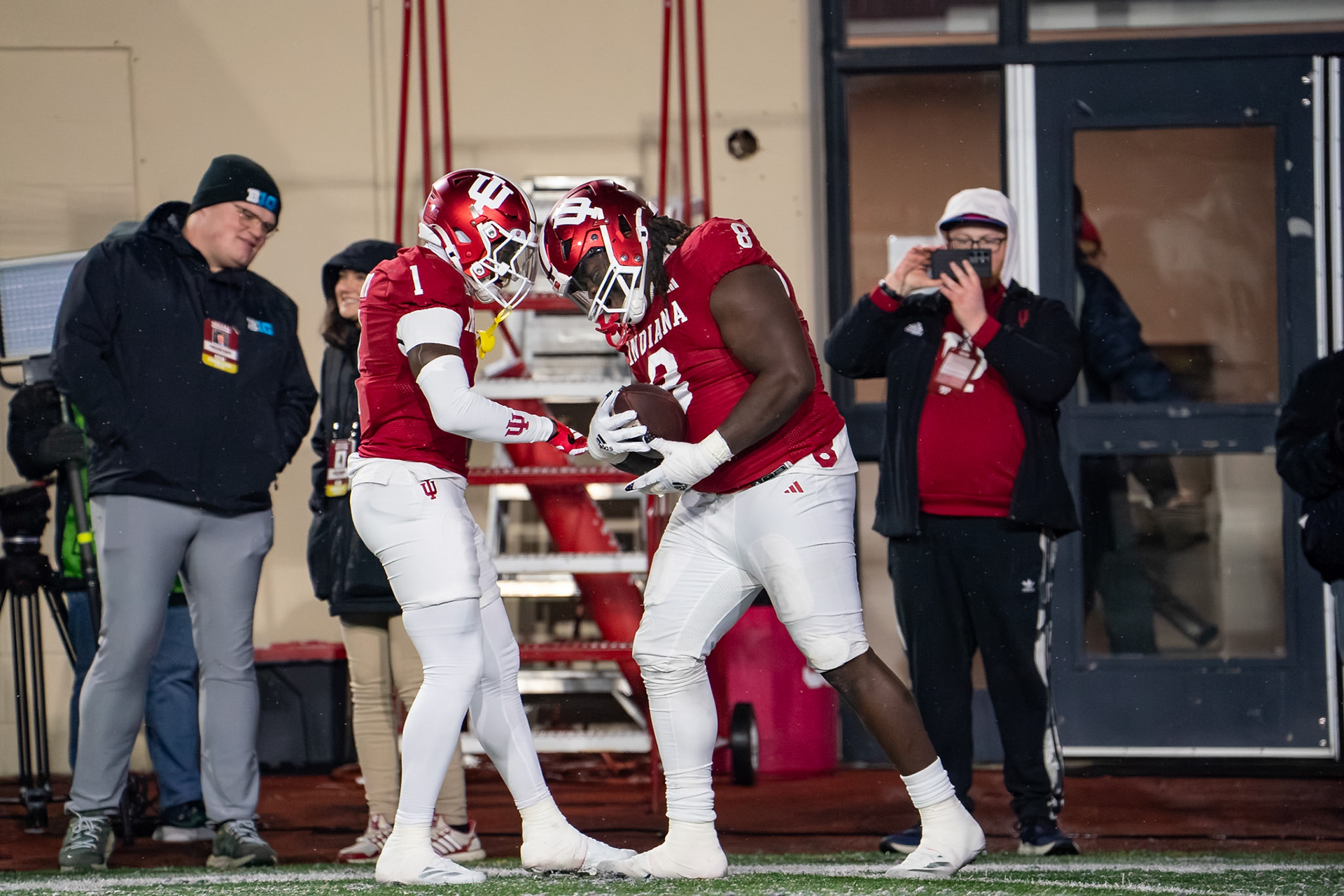 BLOOMINGTON, IN - NOVEMBER 30, 2024: Indiana University Redshirt Senior DL CJ West (8), Indiana University Senior DB Shawn Asbury II (1) during the Purdue University Boilermakers at Indiana University Hoosiers Football game at Memorial Stadium(Photo by Steve Bowen / Bowen Arrow Photography / Northern Indiana Sports Report)