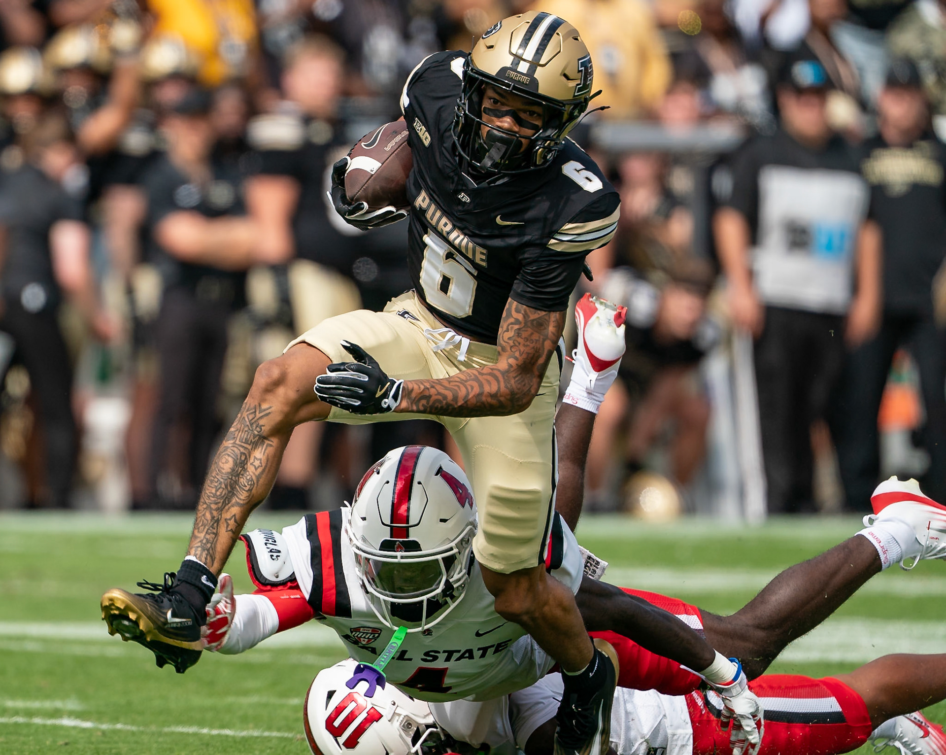 WEST LAFAYETTE, IN - AUGUST 30, 2025: Purdue University Sophomore Wide Receiver Arhmad Branch (6) eludes tacklers Ball State University So. DB Eric McClain (4) and Ball State University R-So. DB Jahmad Harmon (10) at Purdue Boilermaker Football vs Ball State Football at Ross-Ade Stadium(Photo by Steve Bowen / Northern Indiana Sports Report)