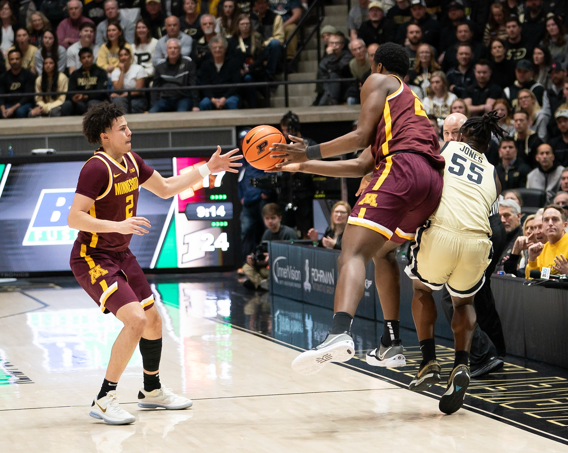 WEST LAFAYETTE, IN - FEBRUARY 15, 2024: Minnesota Sophomore Forward Pharrel Payne (21), Purdue 5th year Guard Lance Jones (55), Minnesota Junior Guard Mike Mitchell Jr. (2) in Purdue Boilermakers Men's Basketball vs the Minnesota Golden Gophers at Mackey Arena(Photo by Steve Bowen / Bowen Arrow Photography / Northern Indiana Sports Report)