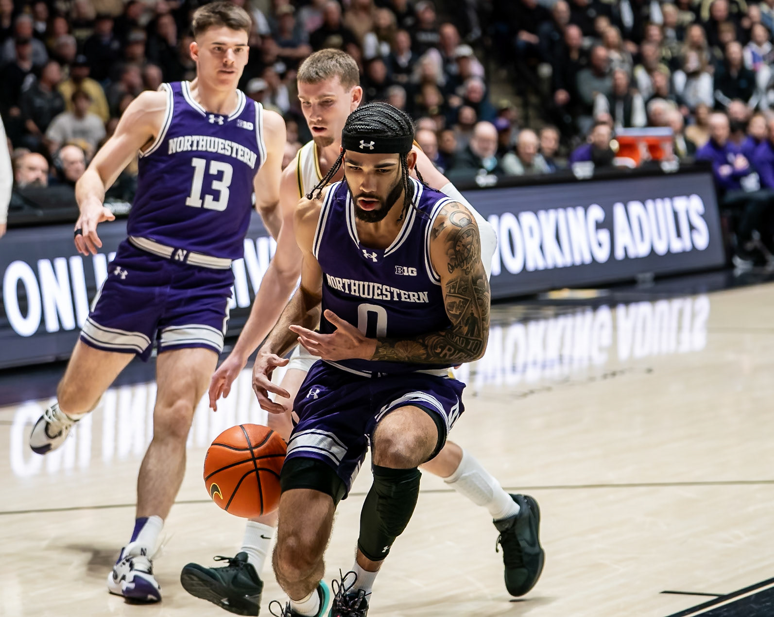 WEST LAFAYETTE, IN - JANUARY 31, 2024: Northwestern Graduate Guard Boo Buie (0), Purdue Sophomore Guard Braden Smith (3) competing in Purdue Boilermakers Mens Basketball versus the Northwestern Wildcats at Mackey Arena(Photo by Steve Bowen / Bowen Arrow Photography / Northern Indiana Sports Report)