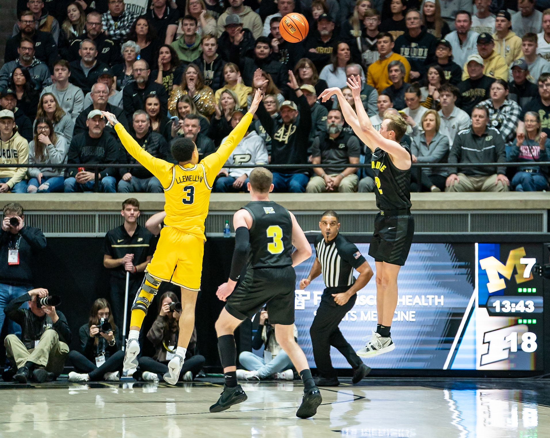 WEST LAFAYETTE, IN - JANUARY 23, 2024: Purdue Sophomore Guard Fletcher Loyer (2), Michigan Graduate Guard Jaelin Llewellyn (3) competing in Purdue versus Michigan Mens Basketball at Mackey Arena(Photo by Steve Bowen / Bowen Arrow Photography / Northern Indiana Sports Report)
