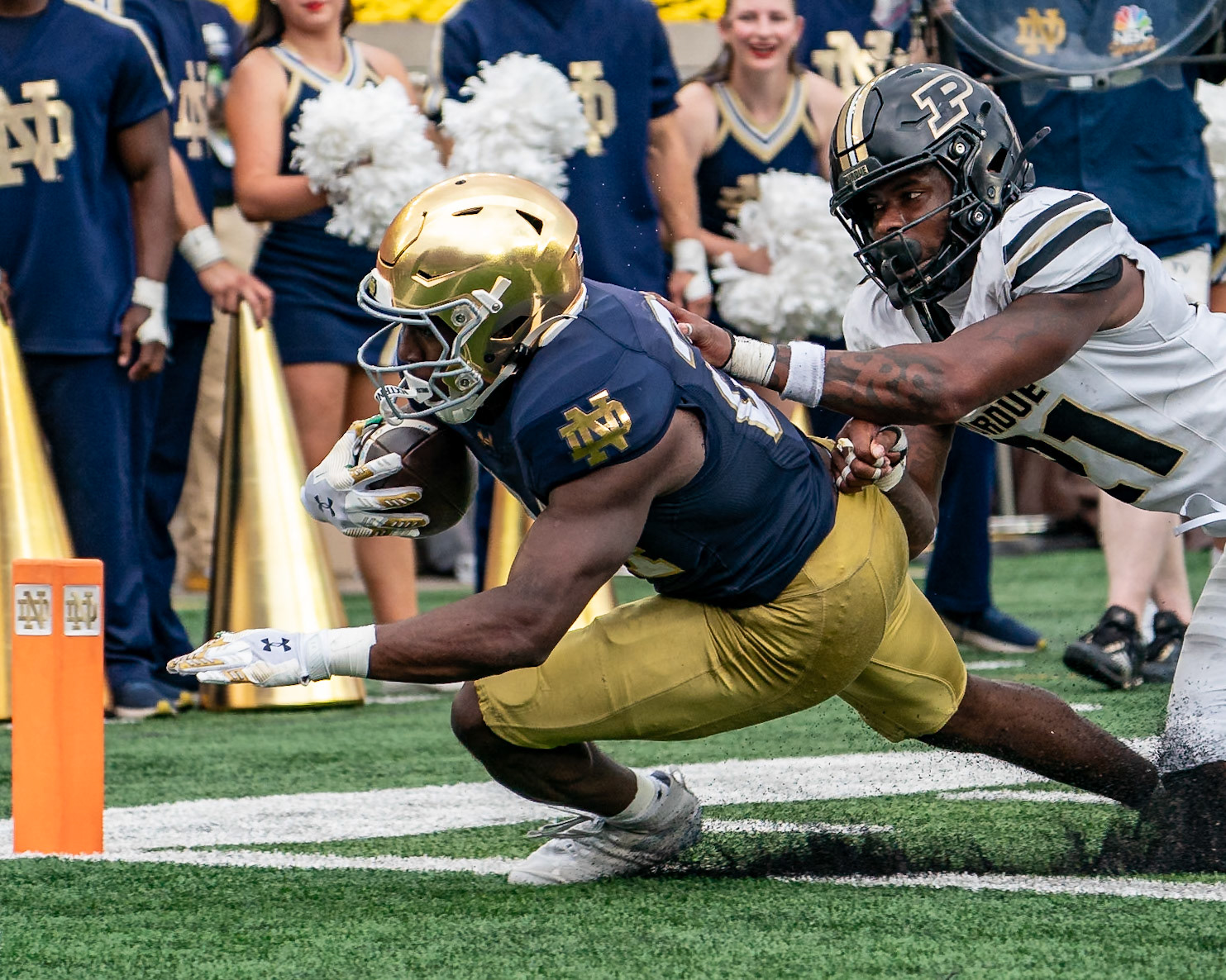 SOUTH BEND, IN - SEPTEMBER 20, 2025: Notre Dame University Junior RB Jadarian Price (24) gets into the corner of the end zone before Purdue University's Senior Defensive Back Tahj Ra-El (21) could tackle him during the Purdue Boilermakers at Notre Dame Fighting Irish Football at Notre Dame Stadium(Photo by Steve Bowen / Northern Indiana Sports Report)