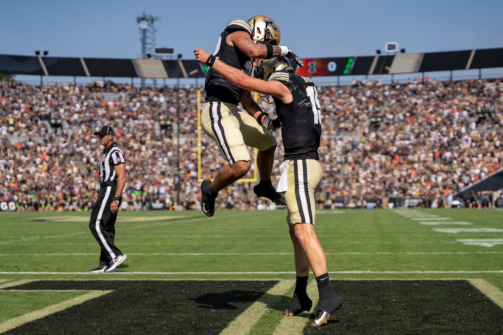 WEST LAFAYETTE, IN - OCTOBER 4, 2025: Purdue University Sophomore Running Back Antonio Harris (22) celebrates with Purdue University Sophomore Quarterback Ryan Browne (15) after Browne scored during the Purdue Boilermaker Football vs University of Illinois Fighting Illini at Ross-Ade Stadium(Photo by Steve Bowen / Northern Indiana Sports Report)