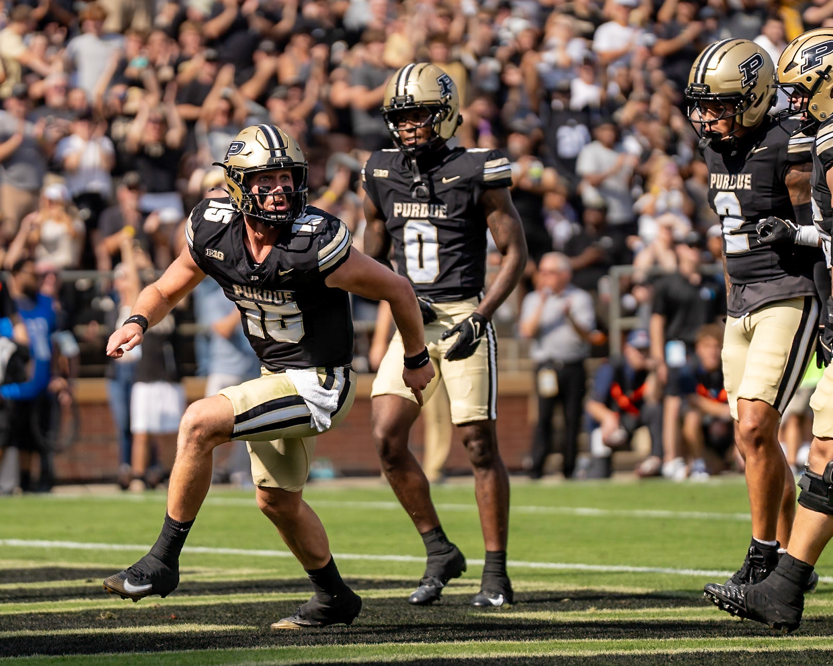 WEST LAFAYETTE, IN - OCTOBER 4, 2025: Purdue University Sophomore Quarterback Ryan Browne (15) comes out from the pile to celebrate a rushing touchdown in Purdue Boilermaker Football vs University of Illinois Fighting Illini at Ross-Ade Stadium(Photo by Steve Bowen / Northern Indiana Sports Report)