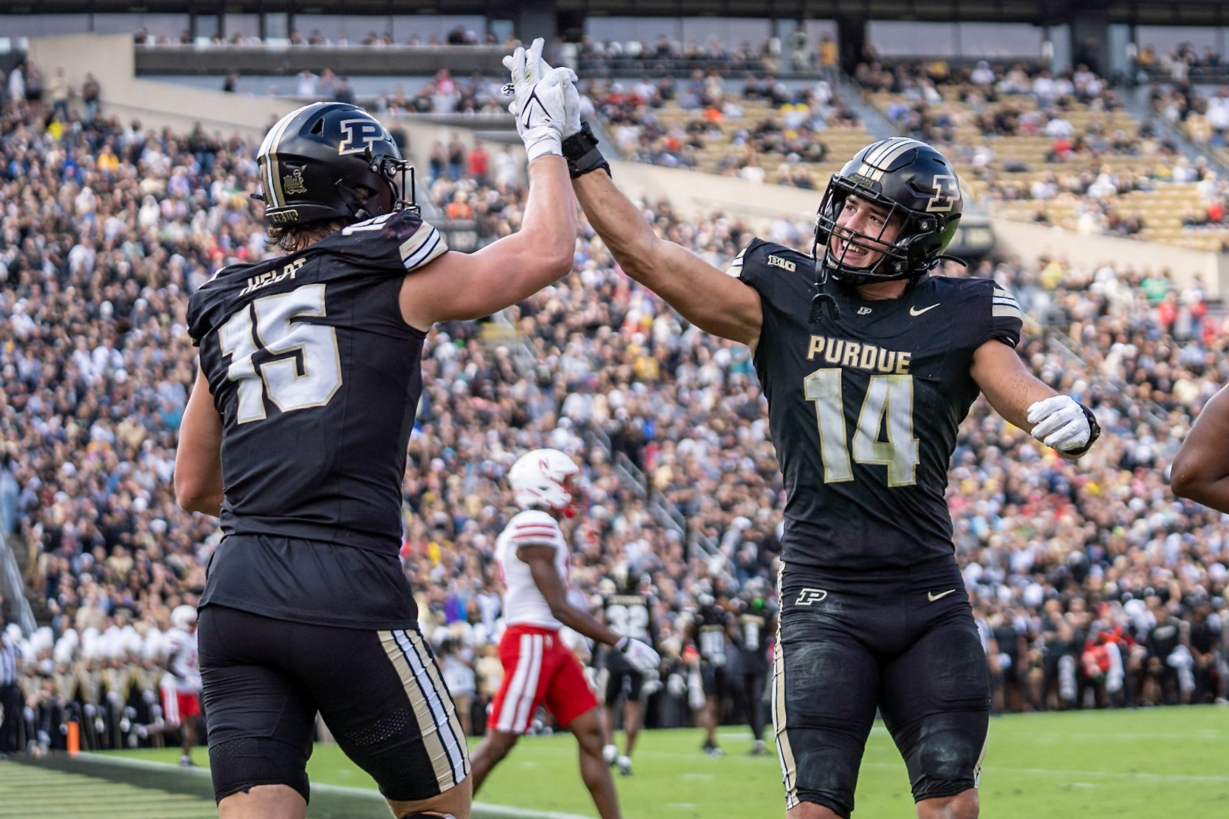 WEST LAFAYETTE, IN - SEPTEMBER 28, 2024: Purdue University Sophomore Rush End Will Heldt (15), Purdue University Junior Linebacker Yanni Karlaftis (14) during the Purdue University Boilermakers vs Nebraska University Cornhuskers Football game at Ross-Ade Stadium(Photo by Steve Bowen / Bowen Arrow Photography / Northern Indiana Sports Report)