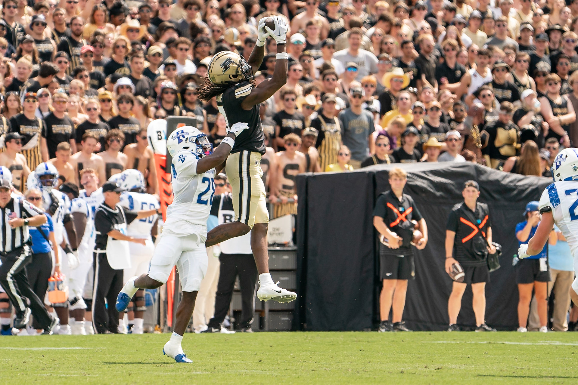 WEST LAFAYETTE, IN - AUGUST 31, 2024: Purdue Jr. WR Jahmal Edrine (7) goes up high for the catch as Indiana State Sr. DB Trey King (28) tries to defend him in the Purdue Boilermaker Football vs Indiana State Sycamores at Ross-Ade Stadium(Photo by Steve Bowen / Bowen Arrow Photography / Northern Indiana Sports Report)