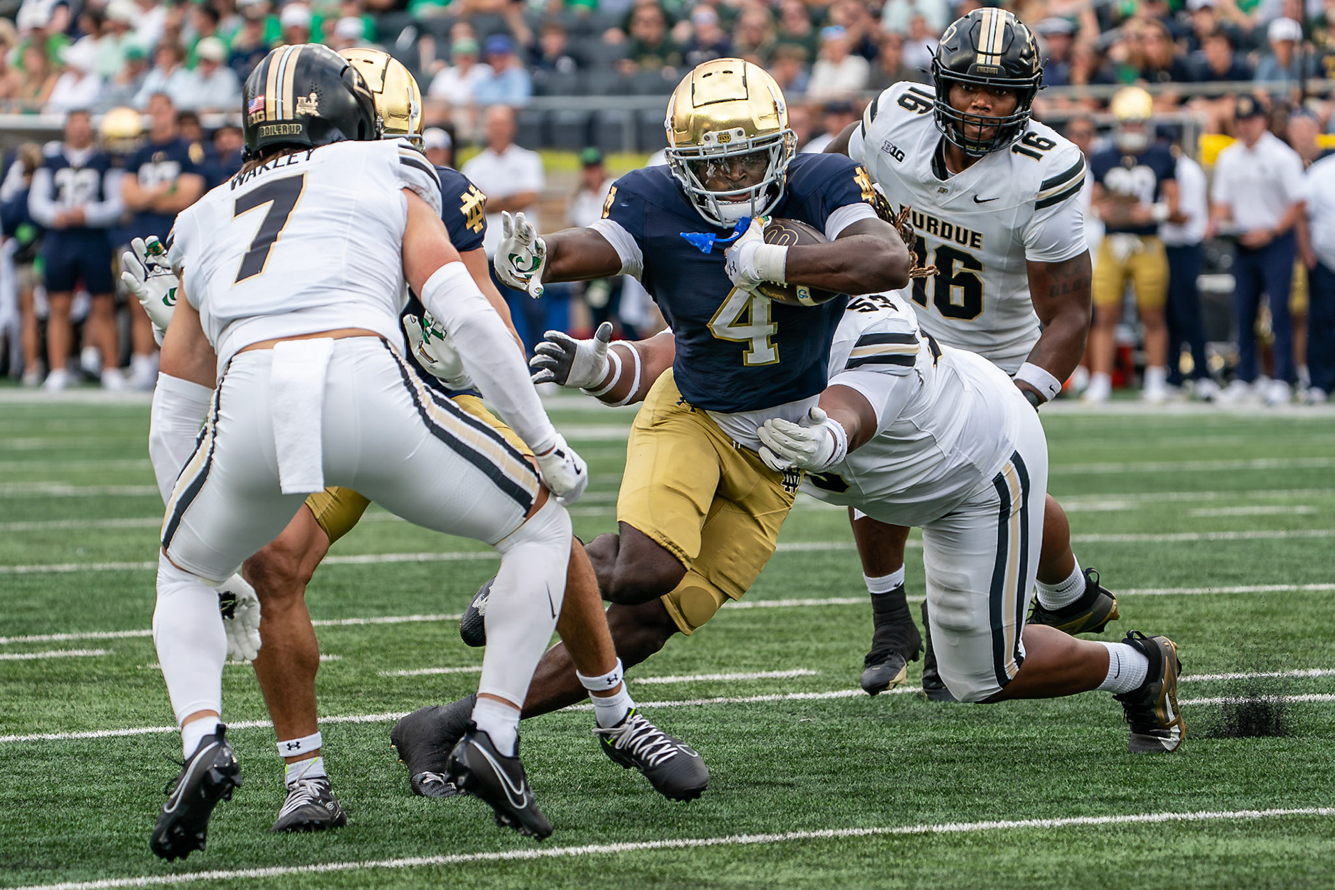 SOUTH BEND, IN - SEPTEMBER 20, 2025: Notre Dame University Junior RB Jeremiyah Love (4) stiff arms during a run in Purdue Boilermakers at Notre Dame Fighting Irish Football at Notre Dame Stadium(Photo by Steve Bowen / Northern Indiana Sports Report)
