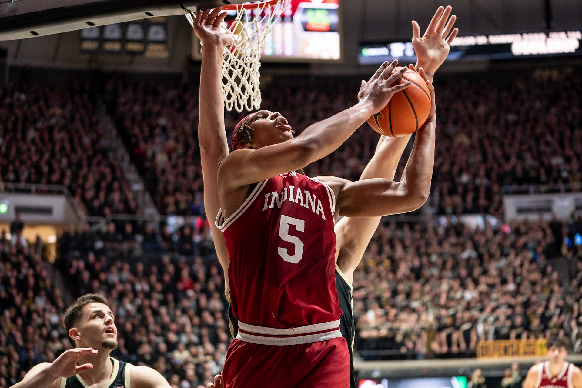 WEST LAFAYETTE, IN - FEBRUARY 10, 2024: Indiana Sophomore Forward Malik Reneau (5), Purdue Senior Center Zach Edey (15) in Purdue Boilermaker vs Indiana Hoosiers Basketball at Mackey Arena(Photo by Steve Bowen / Bowen Arrow Photography / Northern Indiana Sports Report)