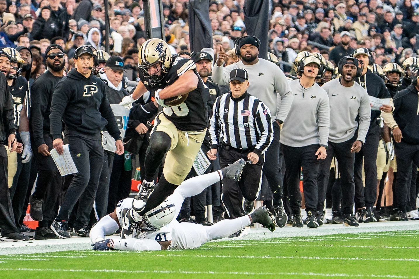 WEST LAFAYETTE, IN - NOVEMBER 16, 2024: Purdue University Sophomore Tight End Max Klare (86) slips through a tackle after catching a pass in Purdue University Boilermakers vs Penn State University Nittany Lions Football game at Ross-Ade Stadium(Photo by Steve Bowen / Bowen Arrow Photography / Northern Indiana Sports Report)