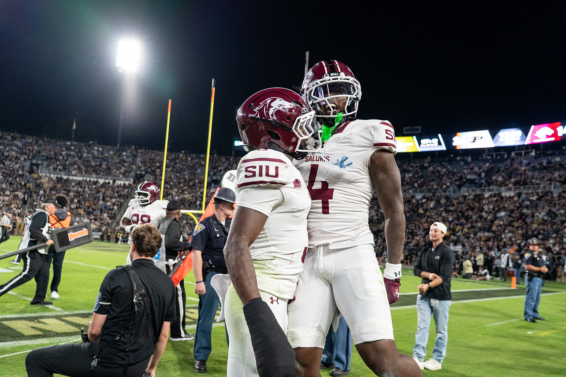 WEST LAFAYETTE, IN - SEPTEMBER 6, 2025: Southern Illinois University So. RB Edward Robinson (4) celebrates with Southern Illinois University Sr. DB Jagger Williams (3) after intercepting the ball during Purdue Boilermaker Football vs Southern Illinois Saluki Football at Ross-Ade Stadium(Photo by Steve Bowen / Northern Indiana Sports Report)