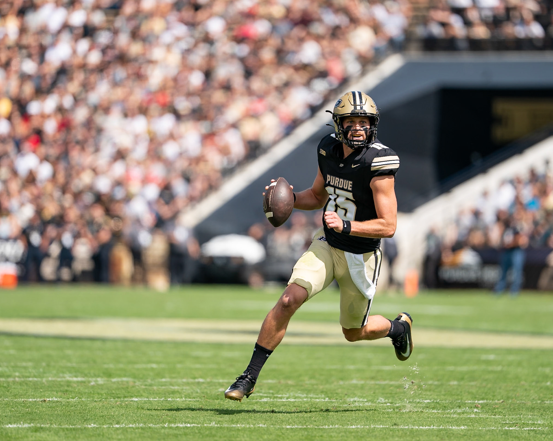 WEST LAFAYETTE, IN - AUGUST 30, 2025: Purdue University Sophomore Quaterback Ryan Browne (15) rolling out at Purdue Boilermaker Football vs Ball State Football at Ross-Ade Stadium(Photo by Steve Bowen / Northern Indiana Sports Report)