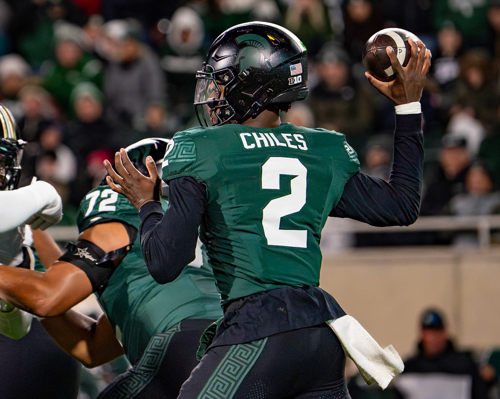 EAST LANSING, MI - NOVEMBER 22, 2024: Michigan State University Quaterback Aidan Chiles (2) ithrowing a pass during the Purdue University Boilermakers at Michigan State University Spartans Football game at Spartan Stadium(Photo by Steve Bowen / Bowen Arrow Photography / Northern Indiana Sports Report)
