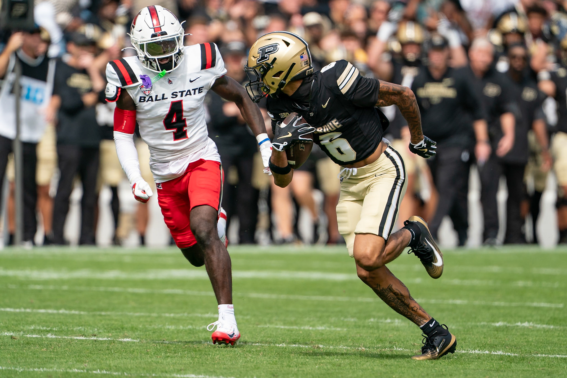 WEST LAFAYETTE, IN - AUGUST 30, 2025: Purdue University Sophomore Wide Receiver Arhmad Branch (6) running towards the end zone as Ball State University So. DB Eric McClain (4) gives chase at Purdue Boilermaker Football vs Ball State Football at Ross-Ade Stadium(Photo by Steve Bowen / Northern Indiana Sports Report)