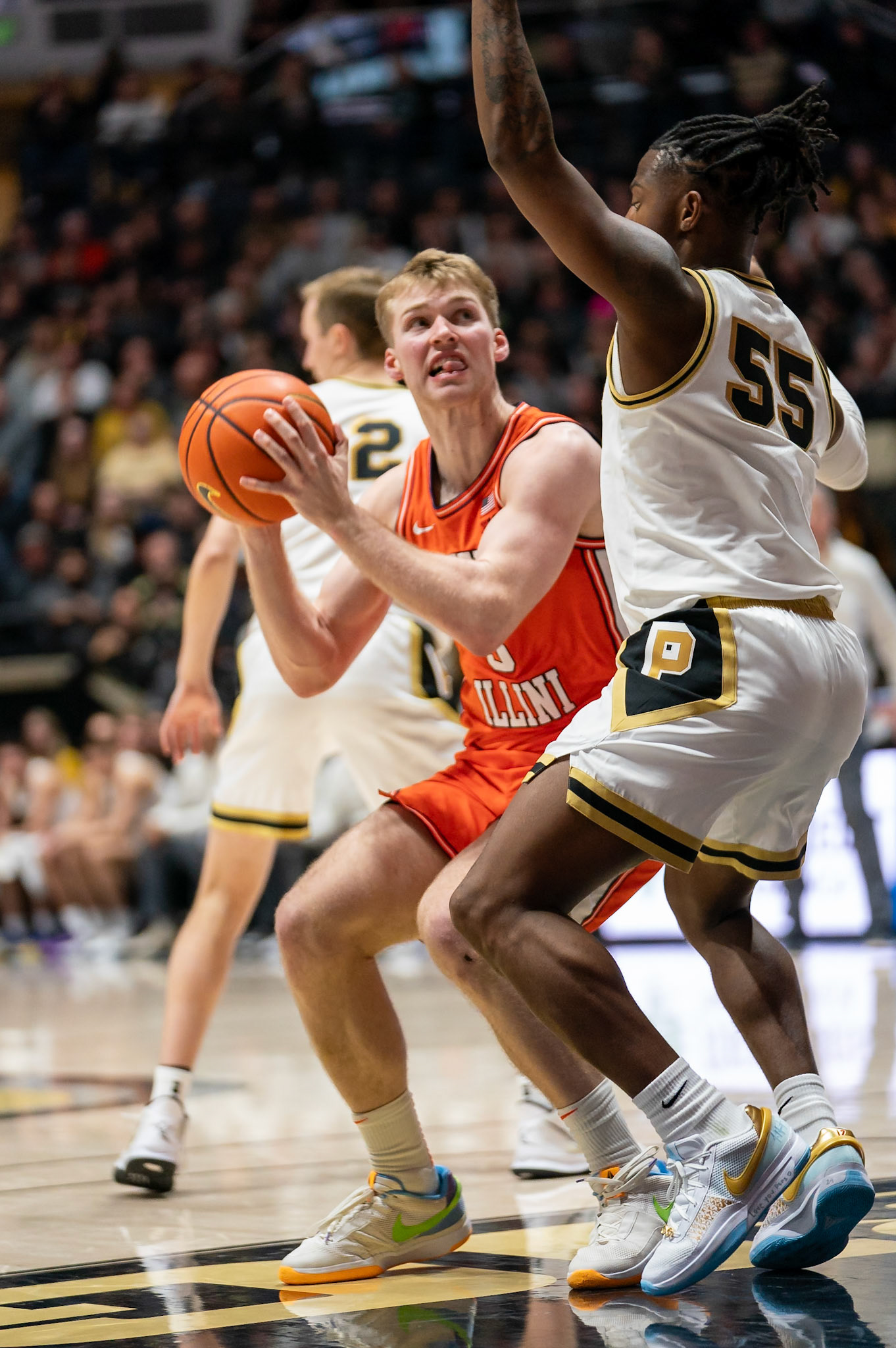 WEST LAFAYETTE, IN - JANUARY 5, 2024: Purdue 5th year Guard Lance Jones (55) guards Illinois Graduate Guard/Forward Marcus Domask (3) in Purdue Boilermaker's Basketball vs the Illinois Fighting Illini at Mackey Arena(Photo by Steve Bowen / Bowen Arrow Photography / Northern Indiana Sports Report)