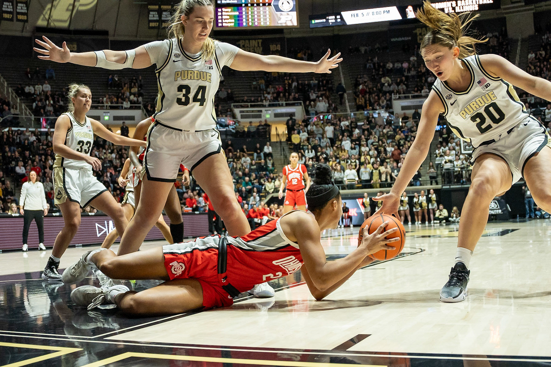 WEST LAFAYETTE, IN - JANUARY 28, 2024: Ohio State Guard/Forward Junior Taylor Thierry (2), Purdue 6th Year Forward Caitlyn Harper (34), Purdue Freshman Forward Mary Ashley Stevenson (20) competing in Purdue Boilermaker Women's Basketball versus the Ohio State Buckeyes at Mackey Arena(Photo by Steve Bowen / Bowen Arrow Photography / Northern Indiana Sports Report)