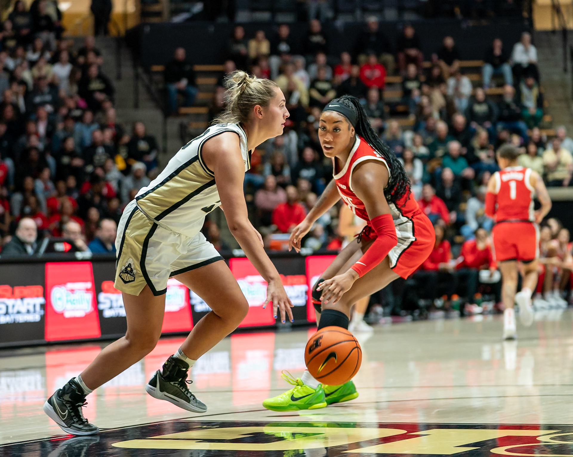 WEST LAFAYETTE, IN - JANUARY 28, 2024: Purdue Senior Guard Madison Layden (33), Ohio State Forward Sophomore Cotie McMahon (32) competing in Purdue Boilermaker Women's Basketball versus the Ohio State Buckeyes at Mackey Arena(Photo by Steve Bowen / Bowen Arrow Photography / Northern Indiana Sports Report)