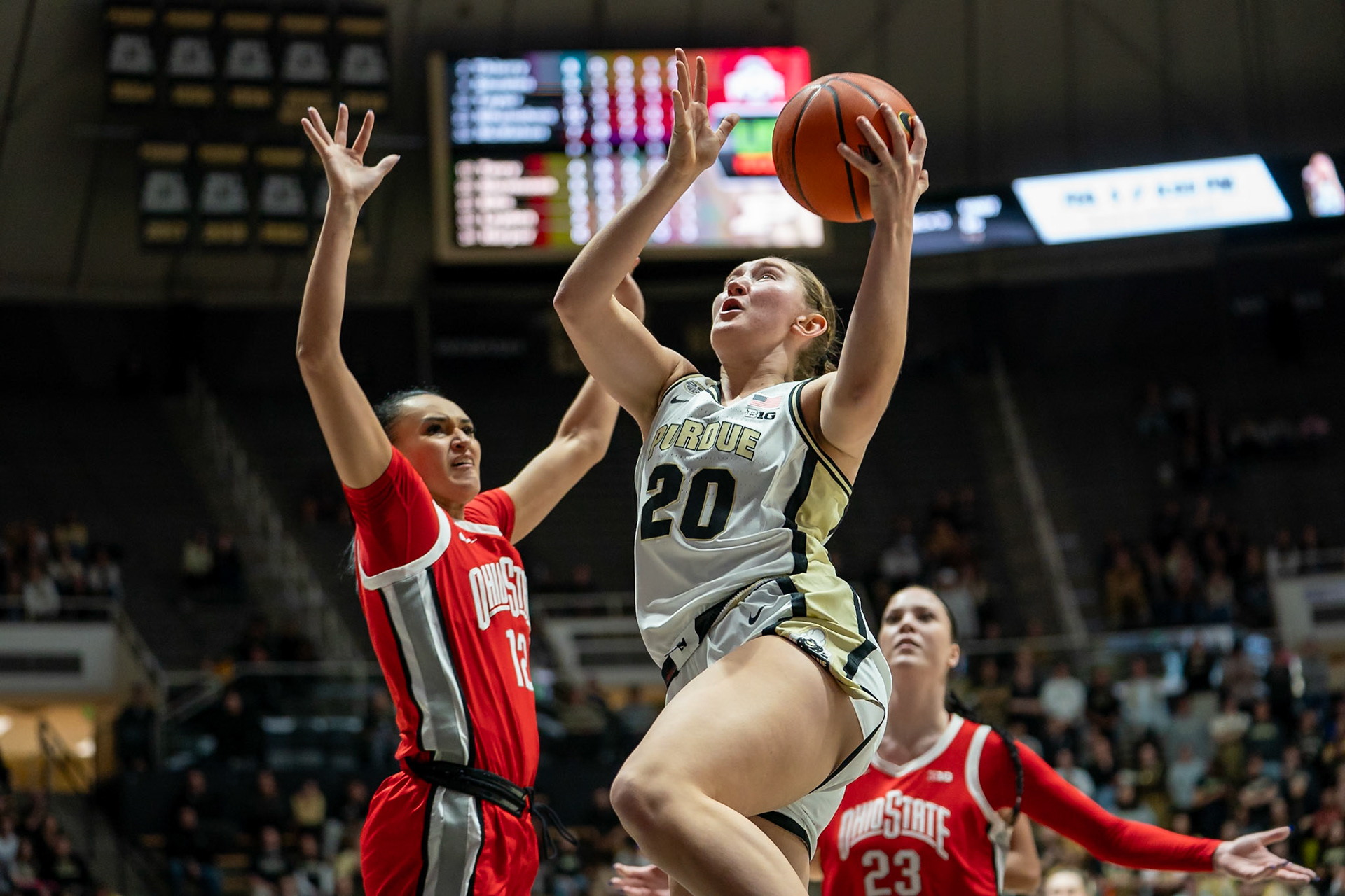 WEST LAFAYETTE, IN - JANUARY 28, 2024: Purdue Freshman Forward Mary Ashley Stevenson (20), Ohio State Guard Graduate Celeste Taylor (12) competing in Purdue Boilermaker Women's Basketball versus the Ohio State Buckeyes at Mackey Arena(Photo by Steve Bowen / Bowen Arrow Photography / Northern Indiana Sports Report)