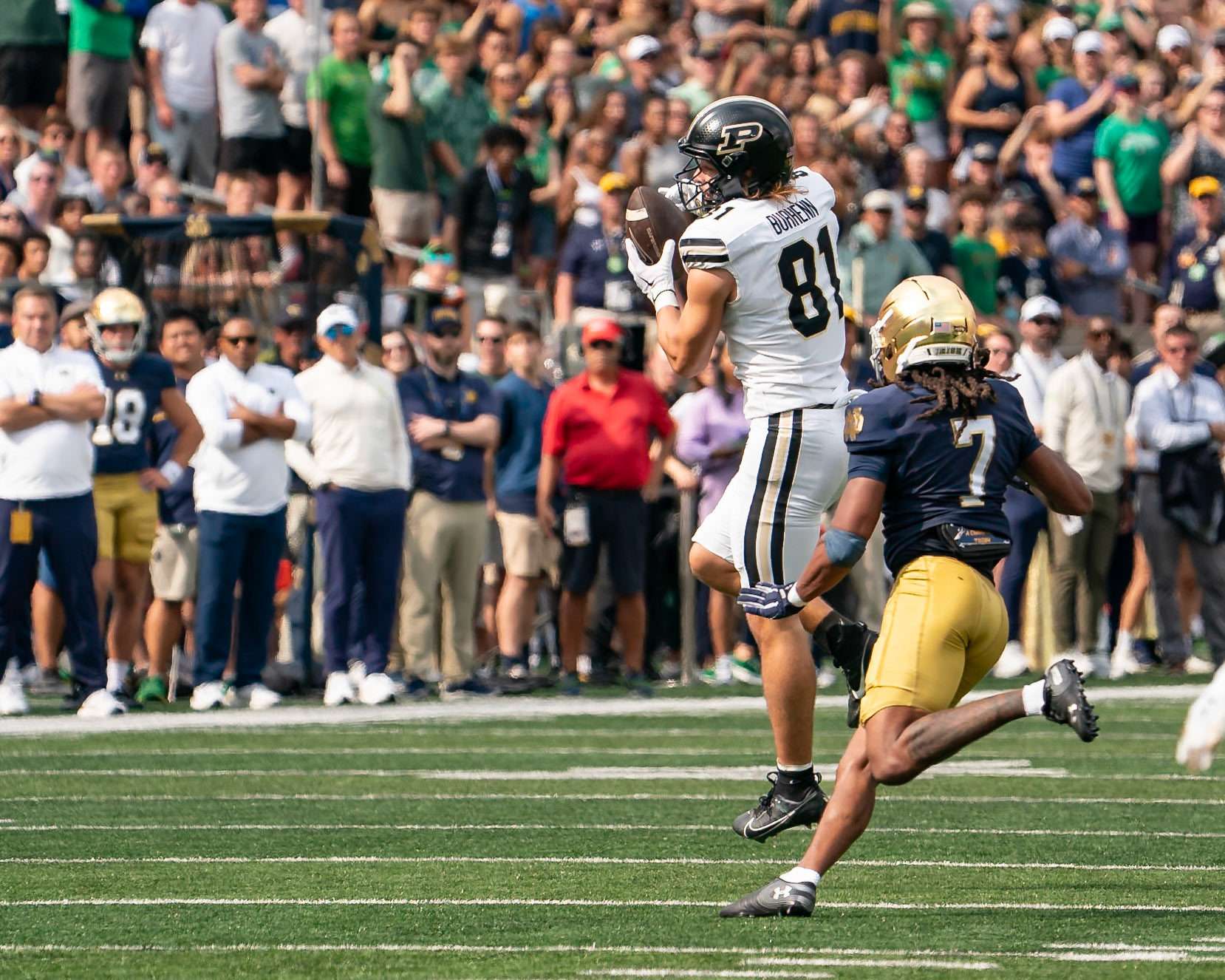 SOUTH BEND, IN - SEPTEMBER 20, 2025: Purdue University Sophomore Tight End George Burhenn (81) catches as pass as Notre Dame University Senior S Jalen Stroman (7) comes for the tackle during the Purdue Boilermakers at Notre Dame Fighting Irish Football at Notre Dame Stadium(Photo by Steve Bowen / Northern Indiana Sports Report)