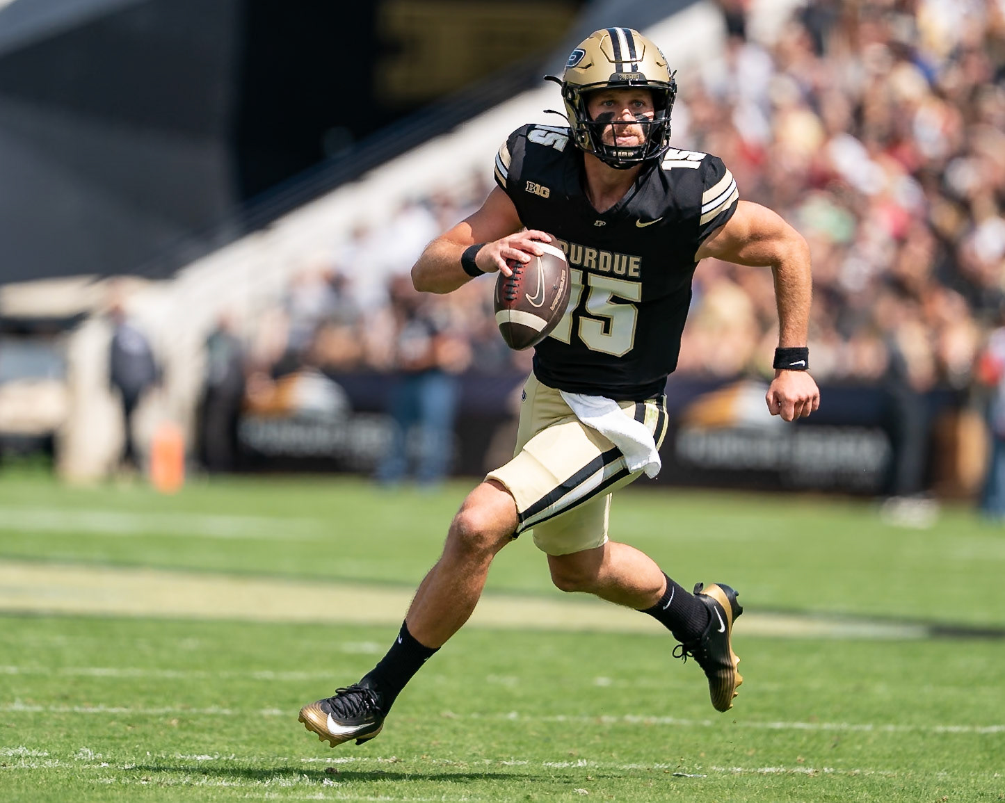 WEST LAFAYETTE, IN - AUGUST 30, 2025: Purdue University Sophomore Quaterback Ryan Browne (15) rolling out at Purdue Boilermaker Football vs Ball State Football at Ross-Ade Stadium(Photo by Steve Bowen / Northern Indiana Sports Report)